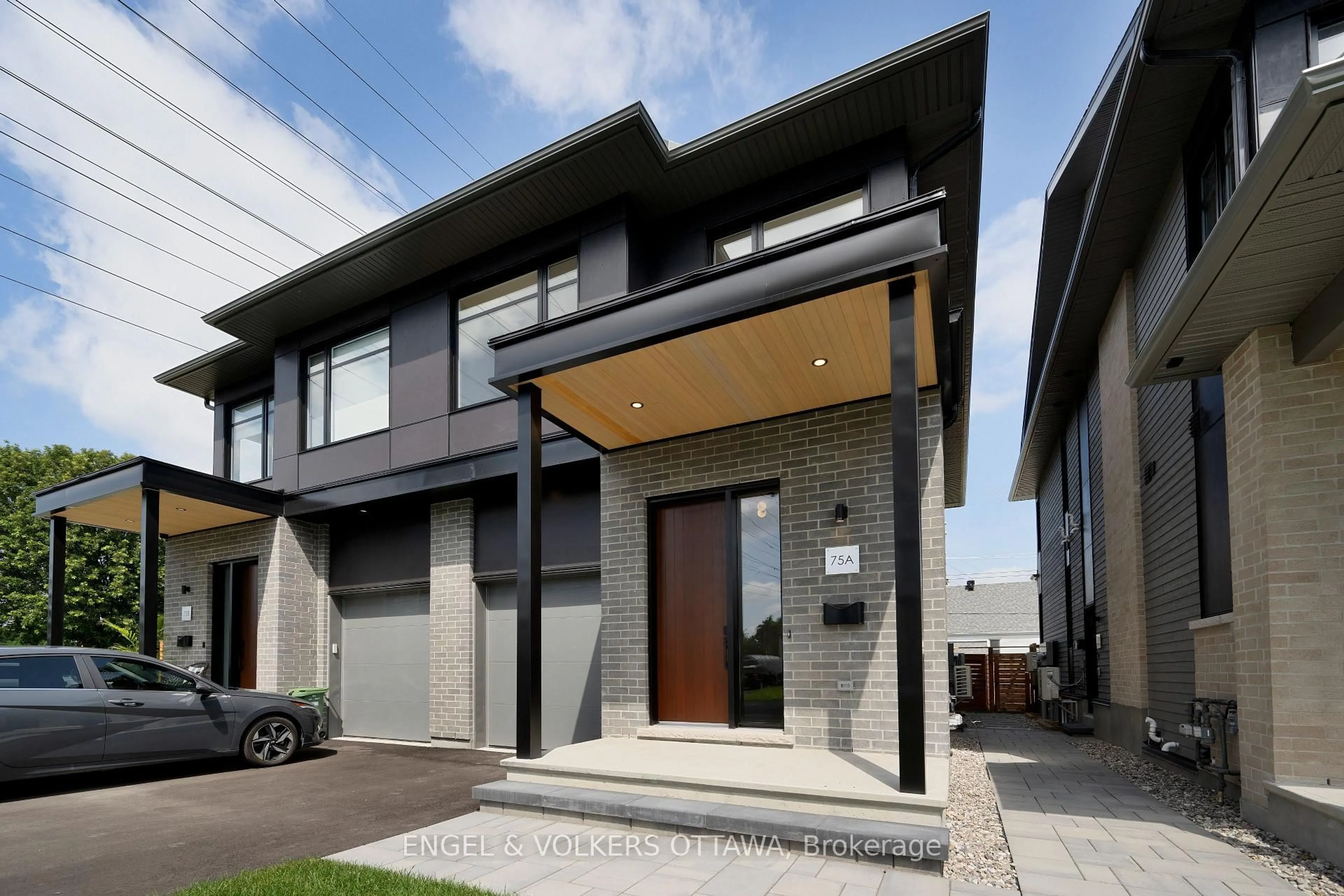 Home with brick exterior material, street for 75 Granton Ave #A, Ottawa Ontario K2G 1W9