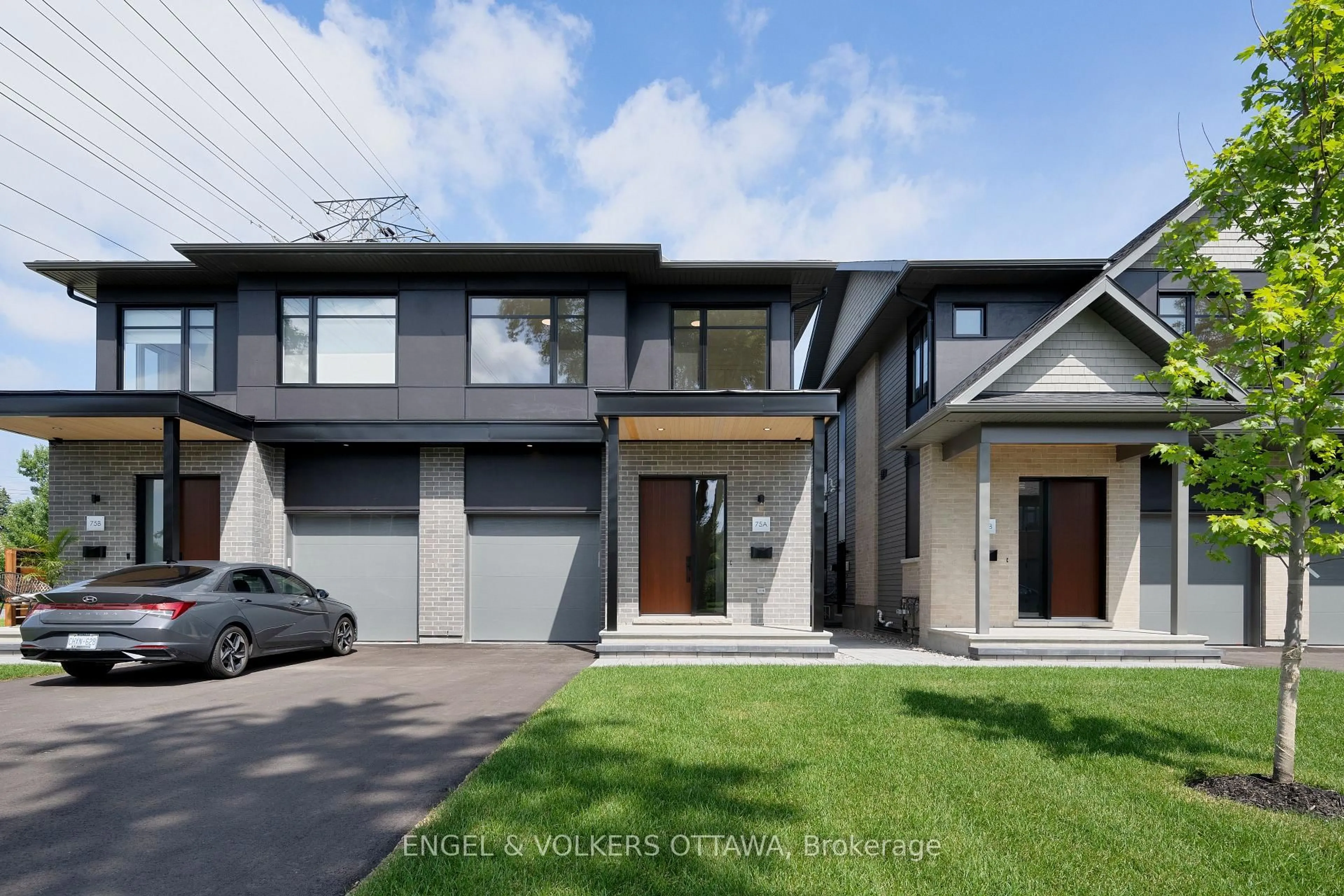 Home with brick exterior material, street for 75 Granton Ave #A, Ottawa Ontario K2G 1W9