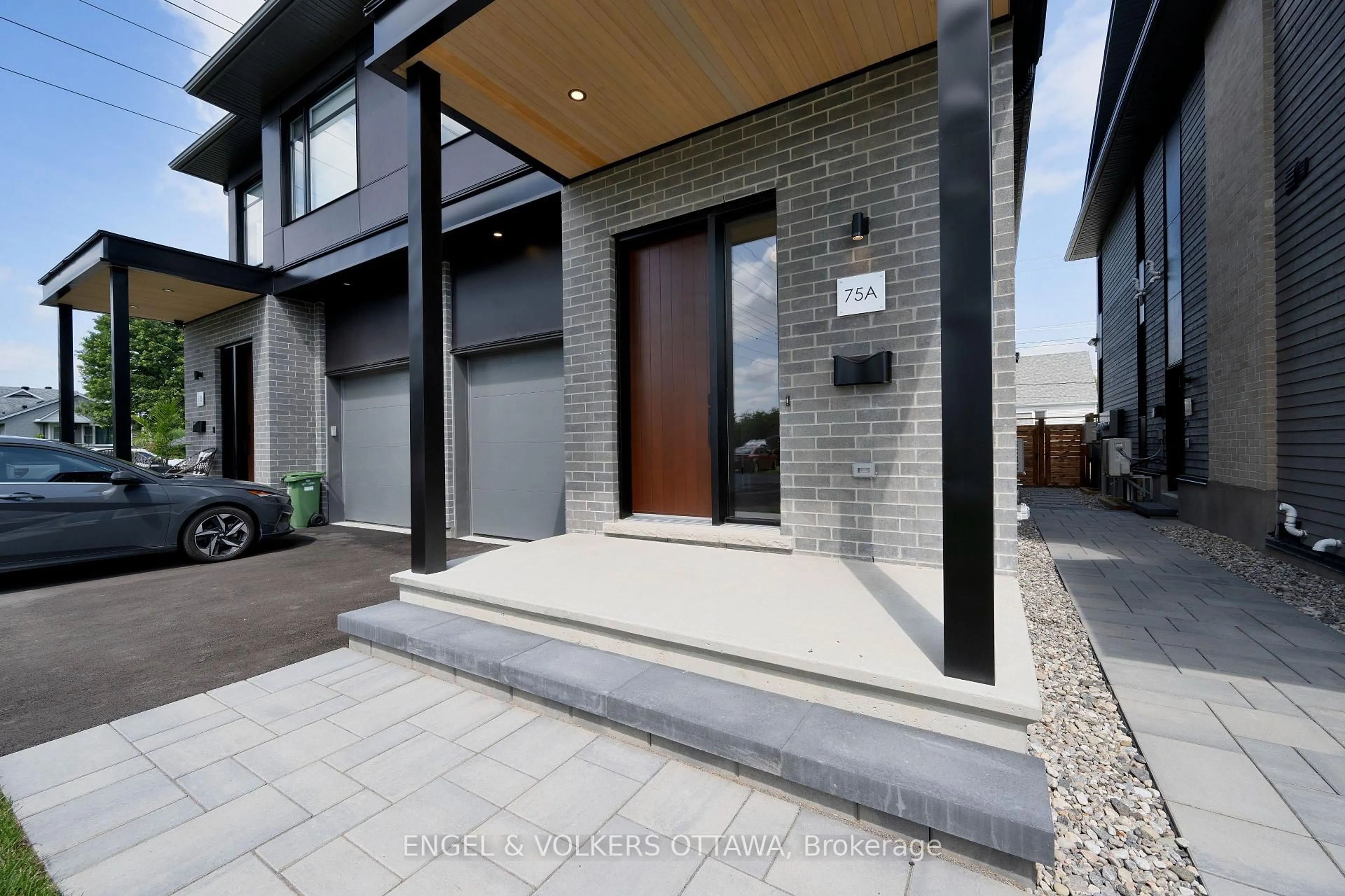 Home with brick exterior material, street for 75 Granton Ave #A, Ottawa Ontario K2G 1W9