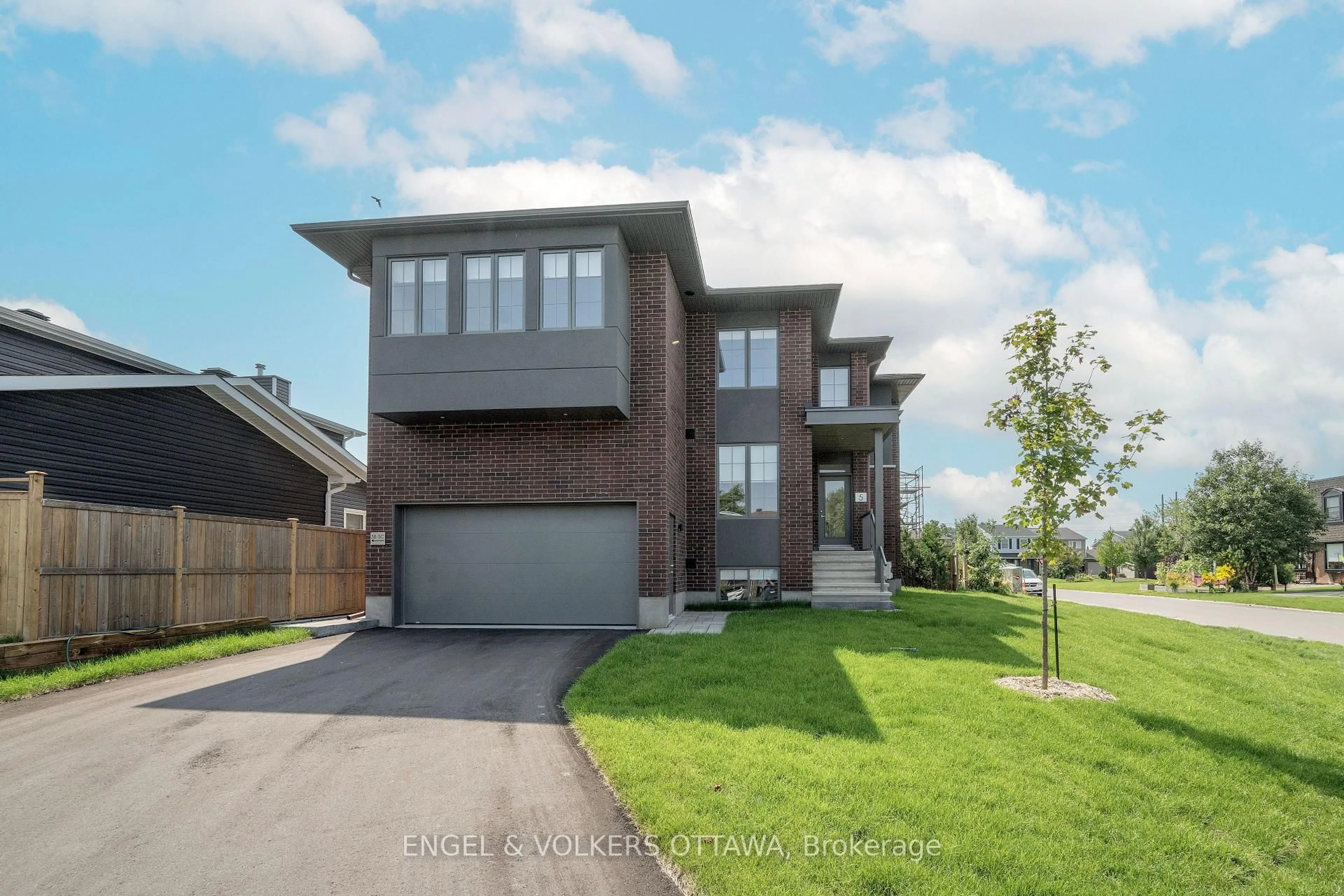 Home with brick exterior material, street for 5 Winlock Cres, Ottawa Ontario K2G 3X5