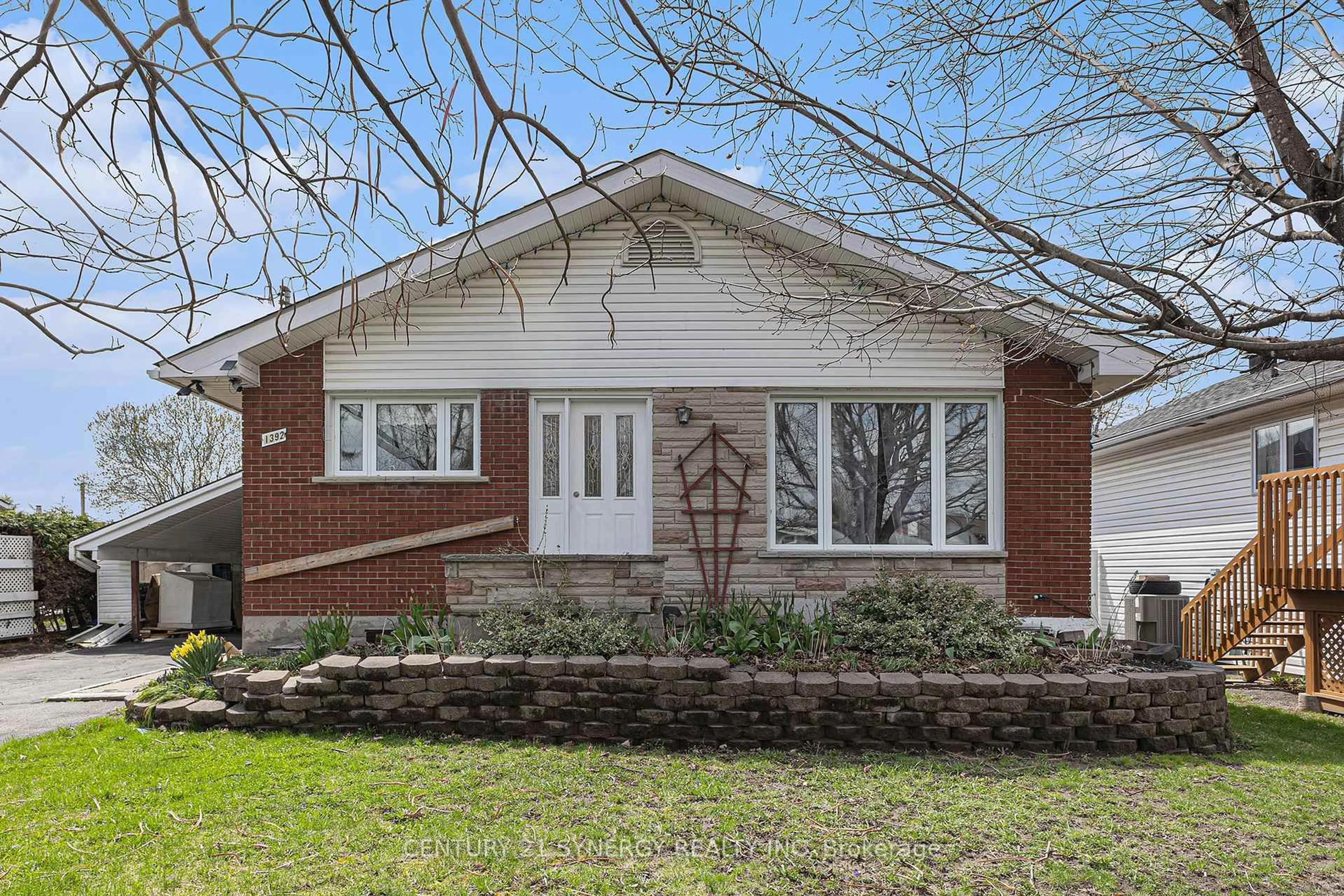 Home with brick exterior material, street for 1392 Aurele St, Ottawa Ontario K1B 3L3