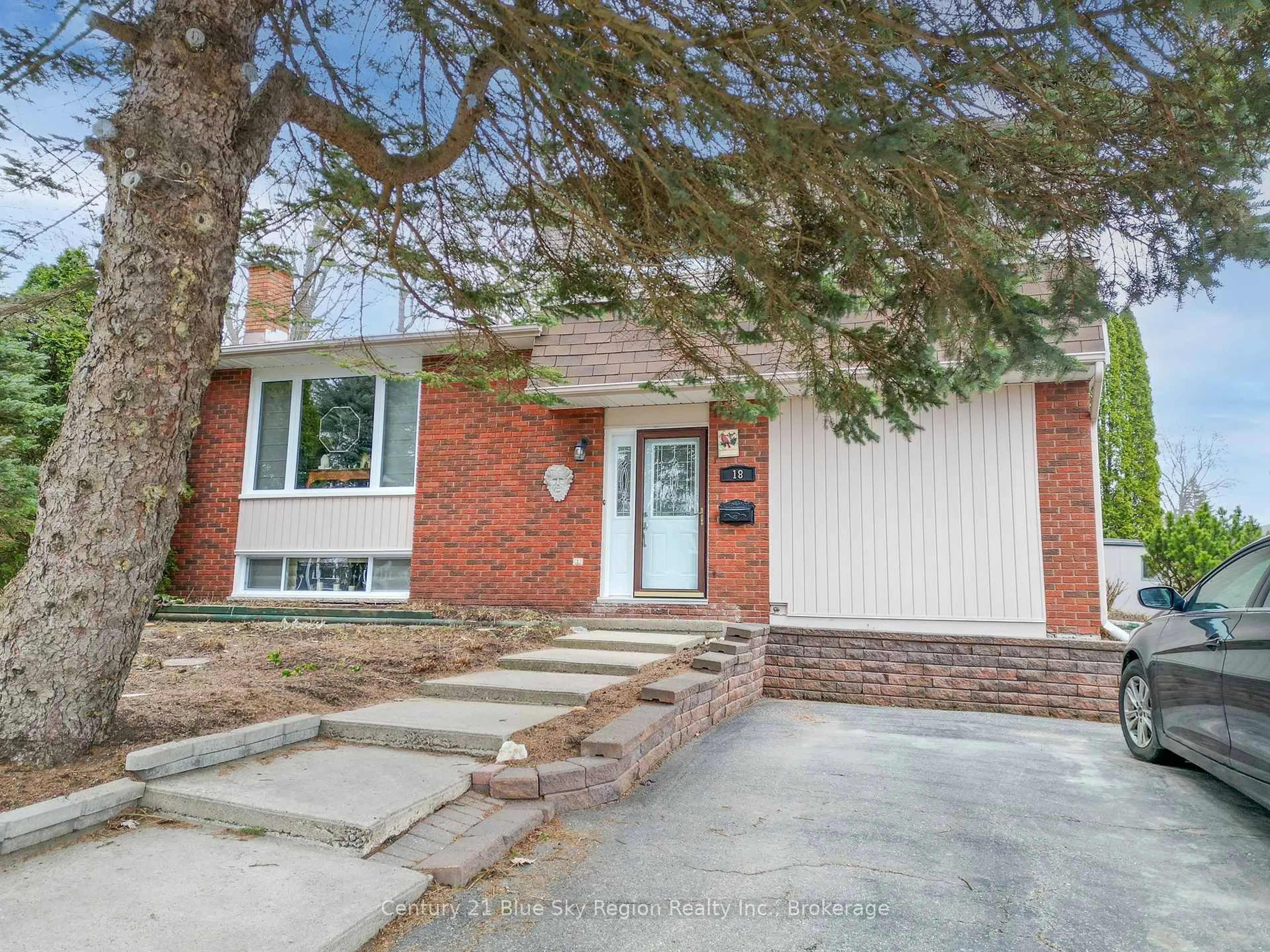 Home with brick exterior material, street for 18 Whippletree Dr, North Bay Ontario P1C 1B8