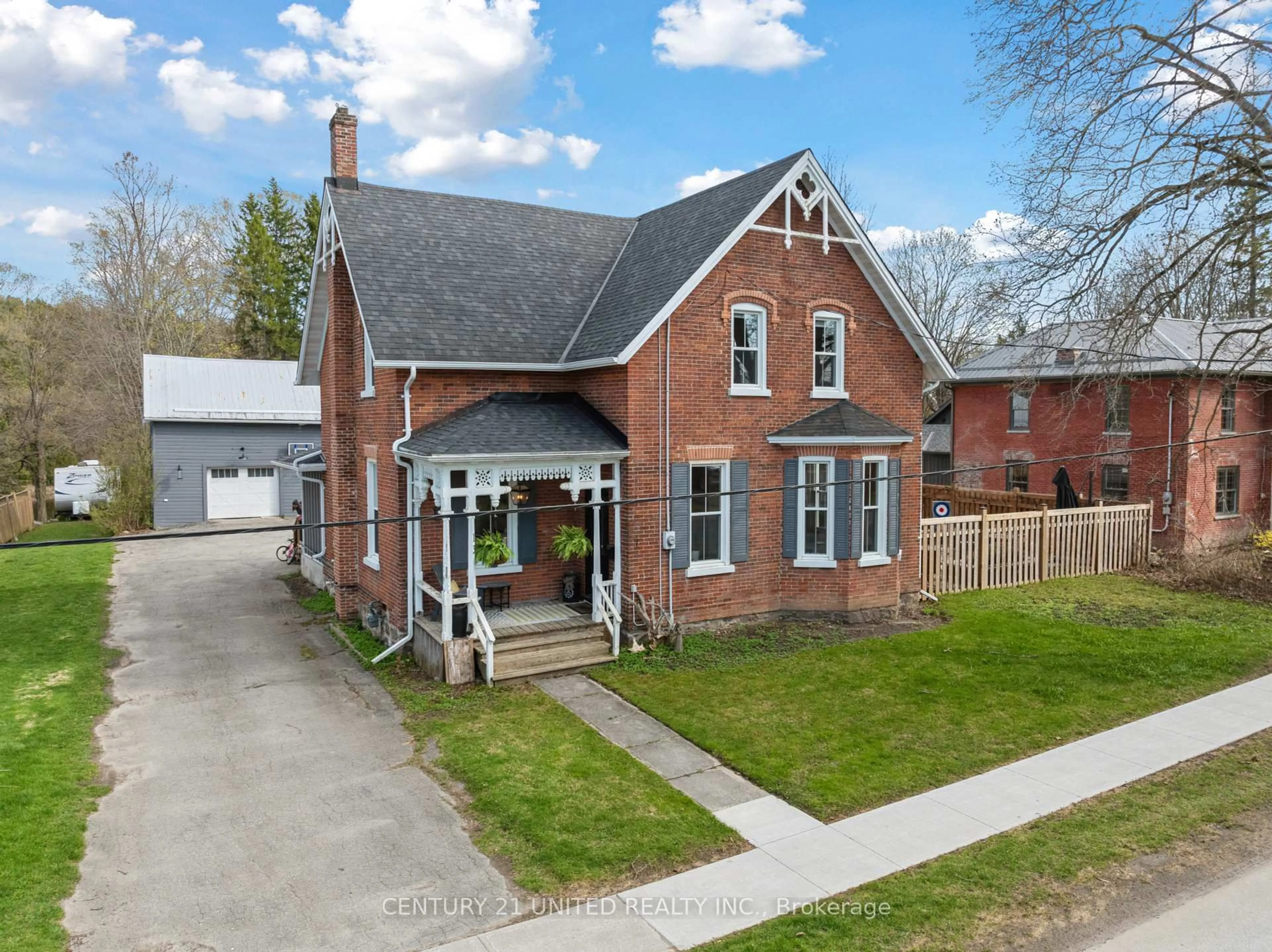 Home with brick exterior material, street for 13 Anne St, Cavan Monaghan Ontario K9J 4S3