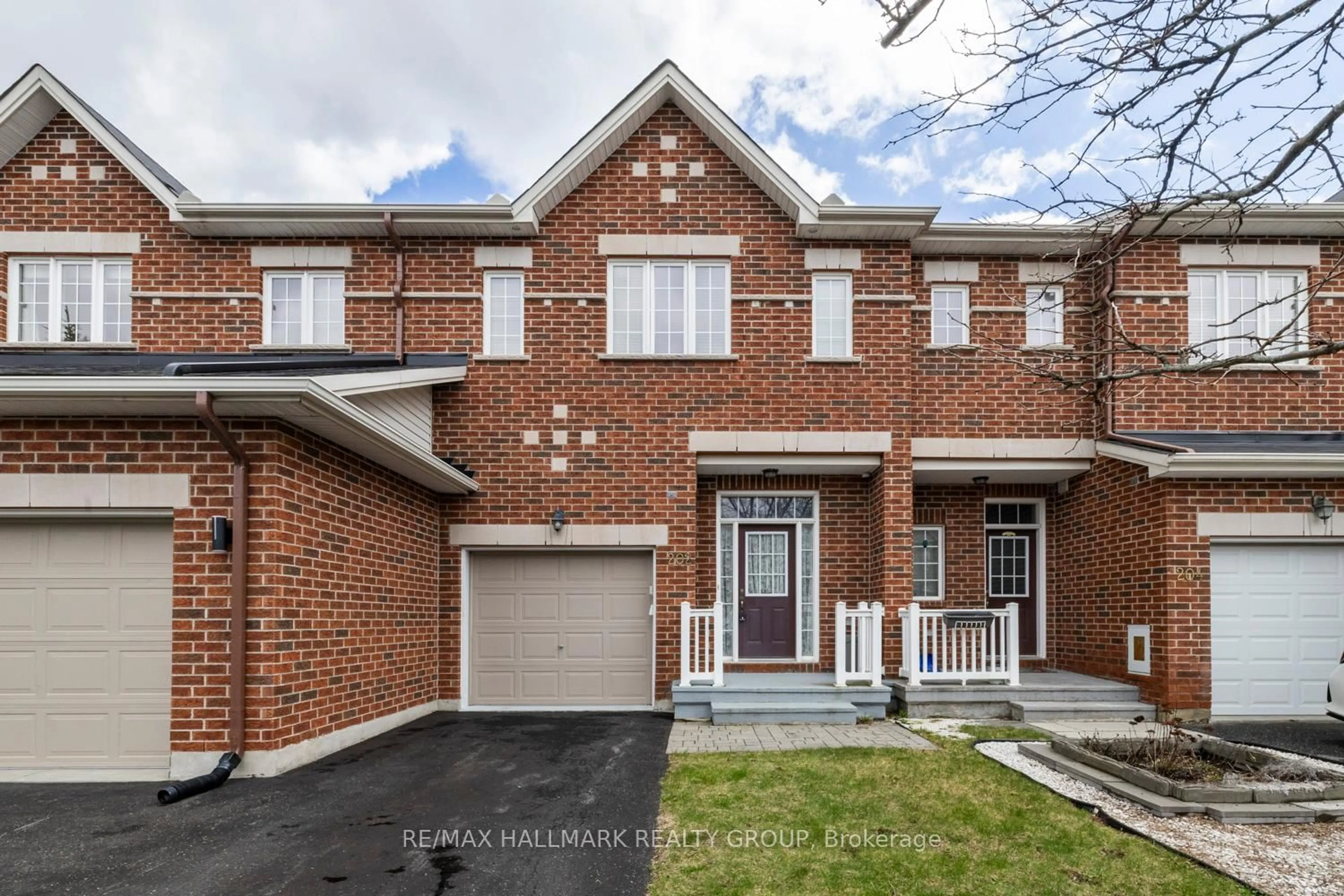 Home with brick exterior material, street for 202 Waymark Cres, Ottawa Ontario K2M 0A6