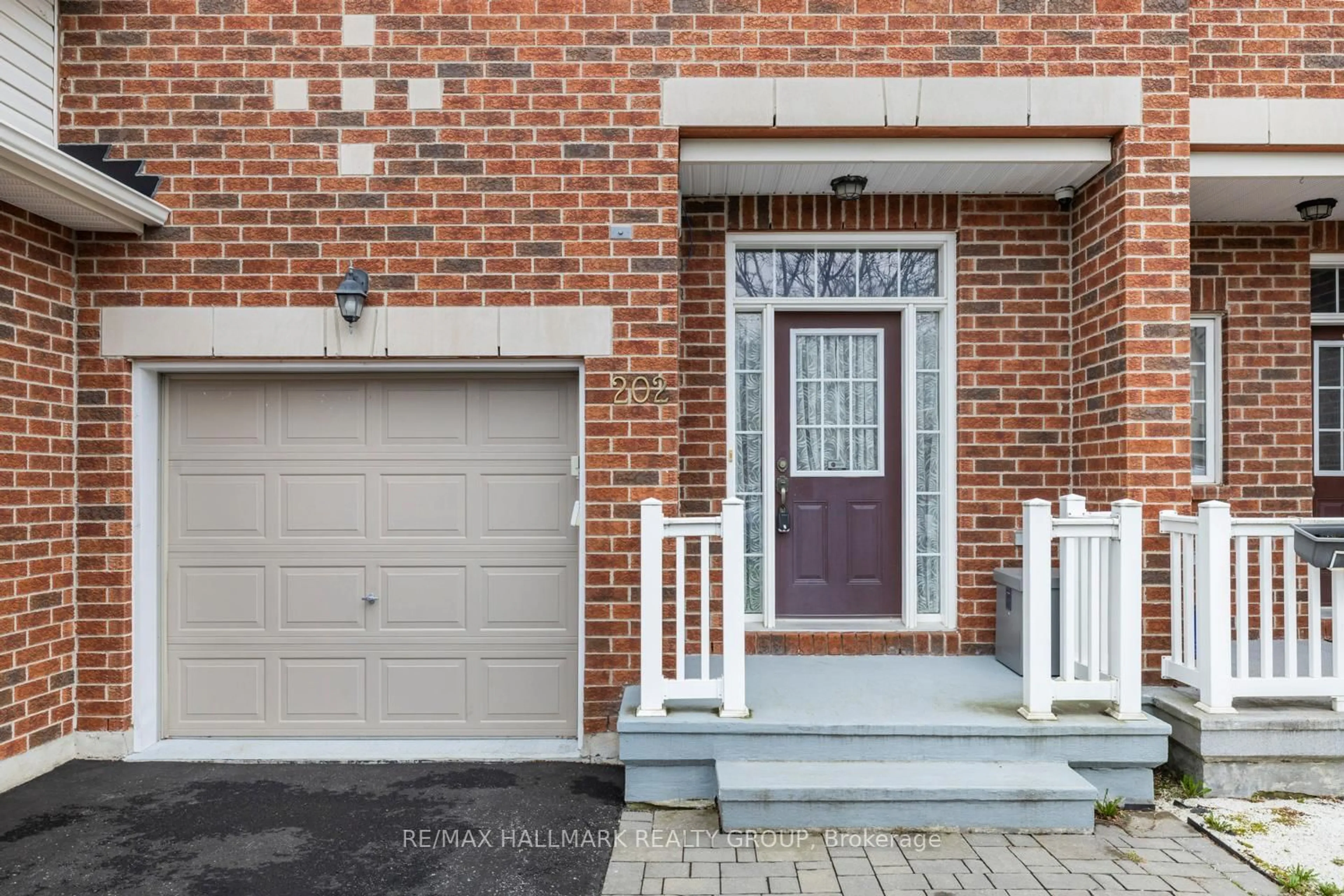 Home with brick exterior material, street for 202 Waymark Cres, Ottawa Ontario K2M 0A6