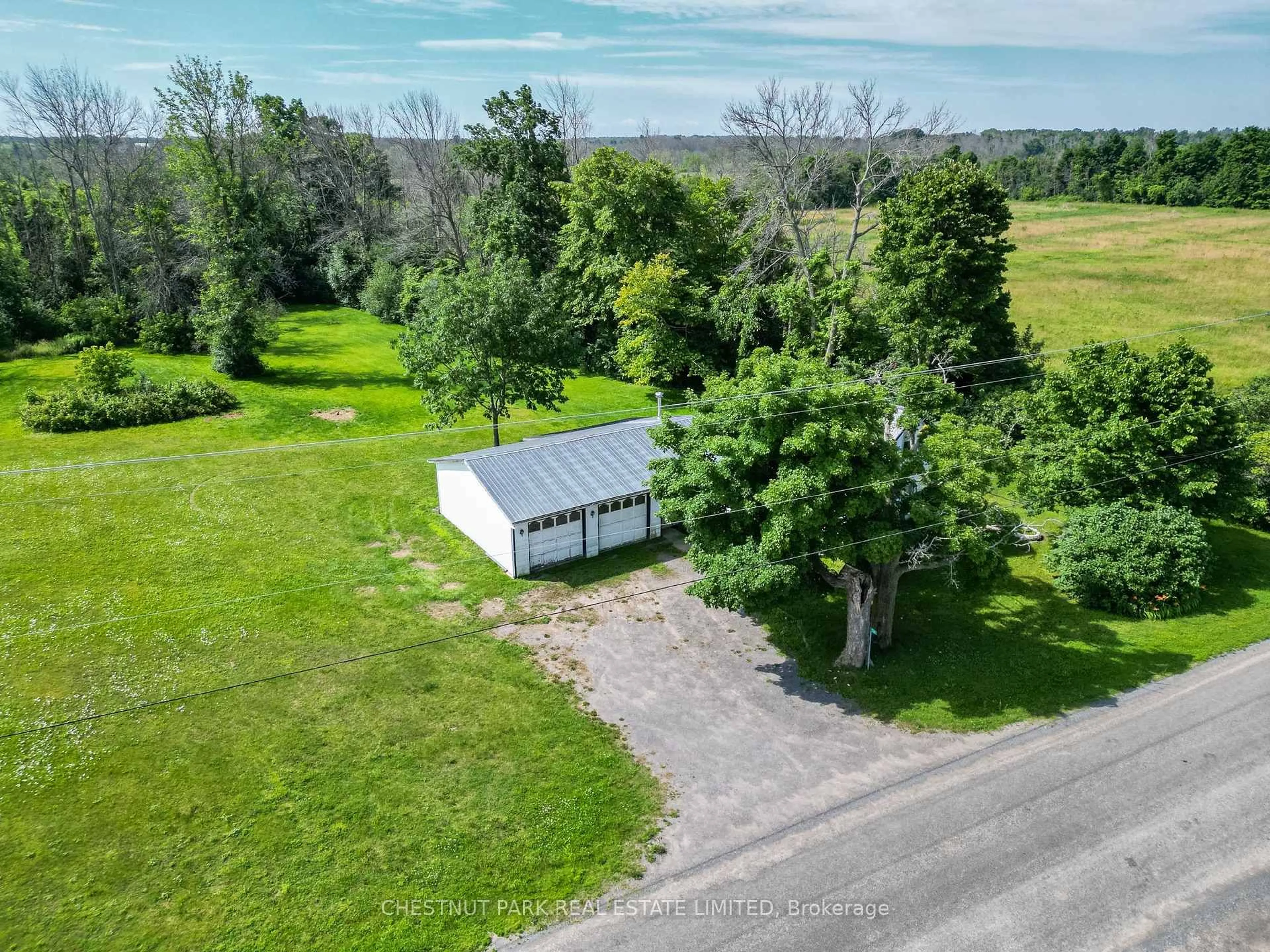 A pic from outside/outdoor area/front of a property/back of a property/a pic from drone, unknown for 126 Murphy Rd, Prince Edward County Ontario K0K 2P0