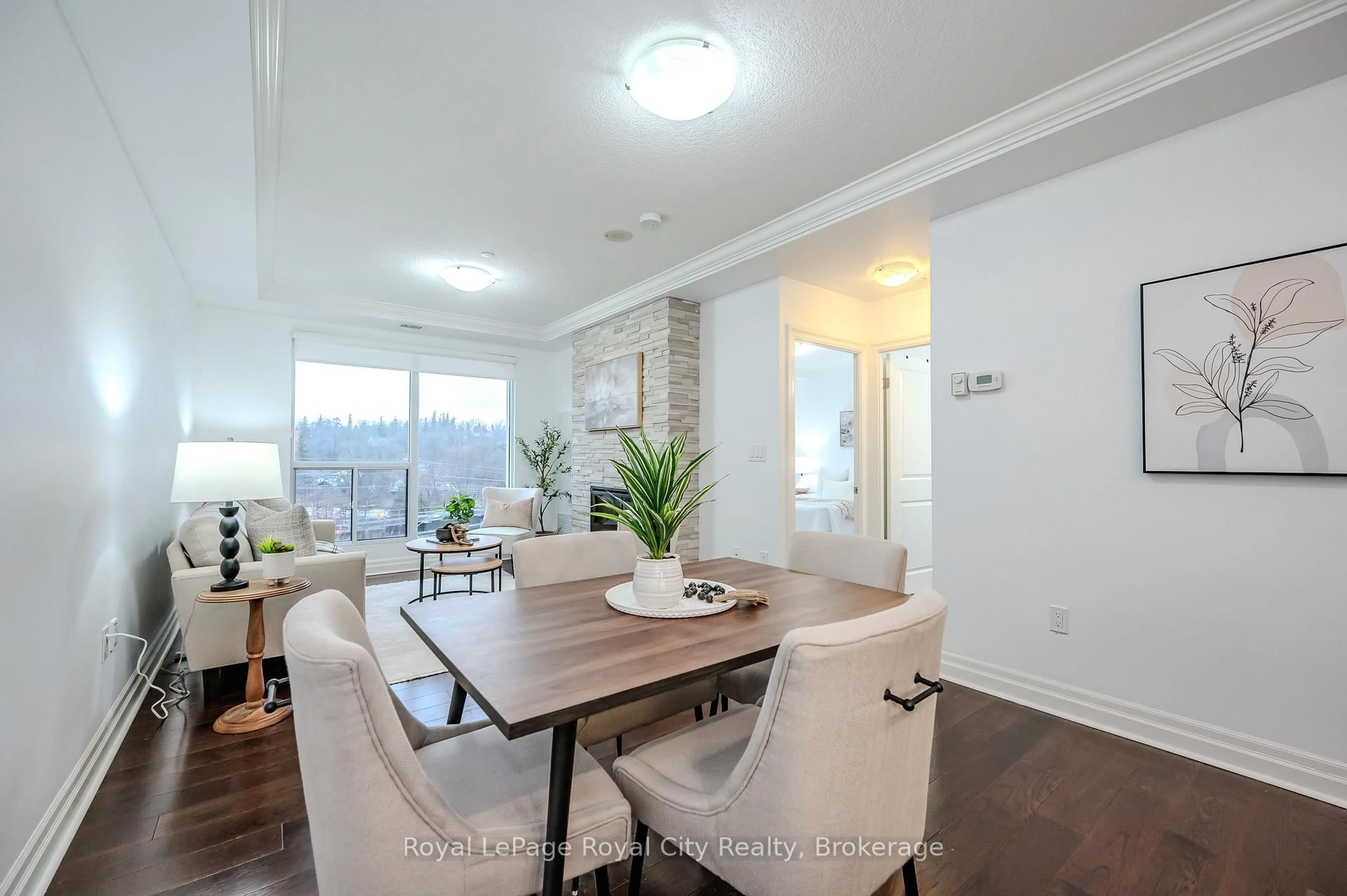 Dining room, wood/laminate floor for 150 Wellington St #507, Guelph Ontario N1H 3R2