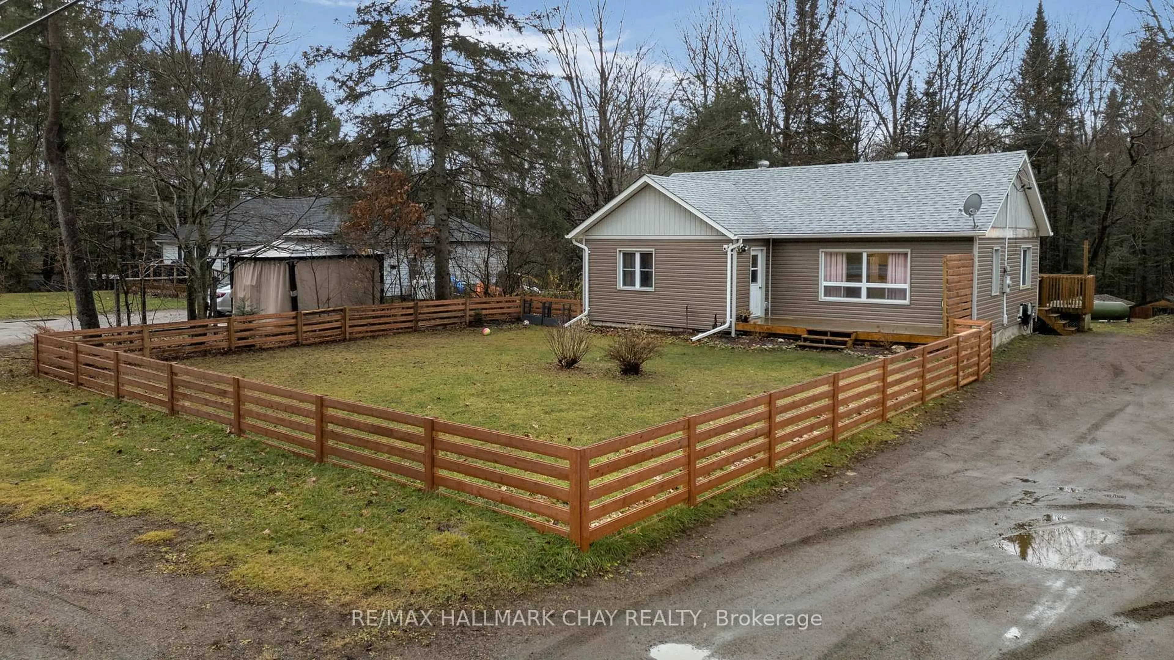 A pic from outside/outdoor area/front of a property/back of a property/a pic from drone, street for 13045 Highway 35 Highway, Minden Hills Ontario K0M 2K0
