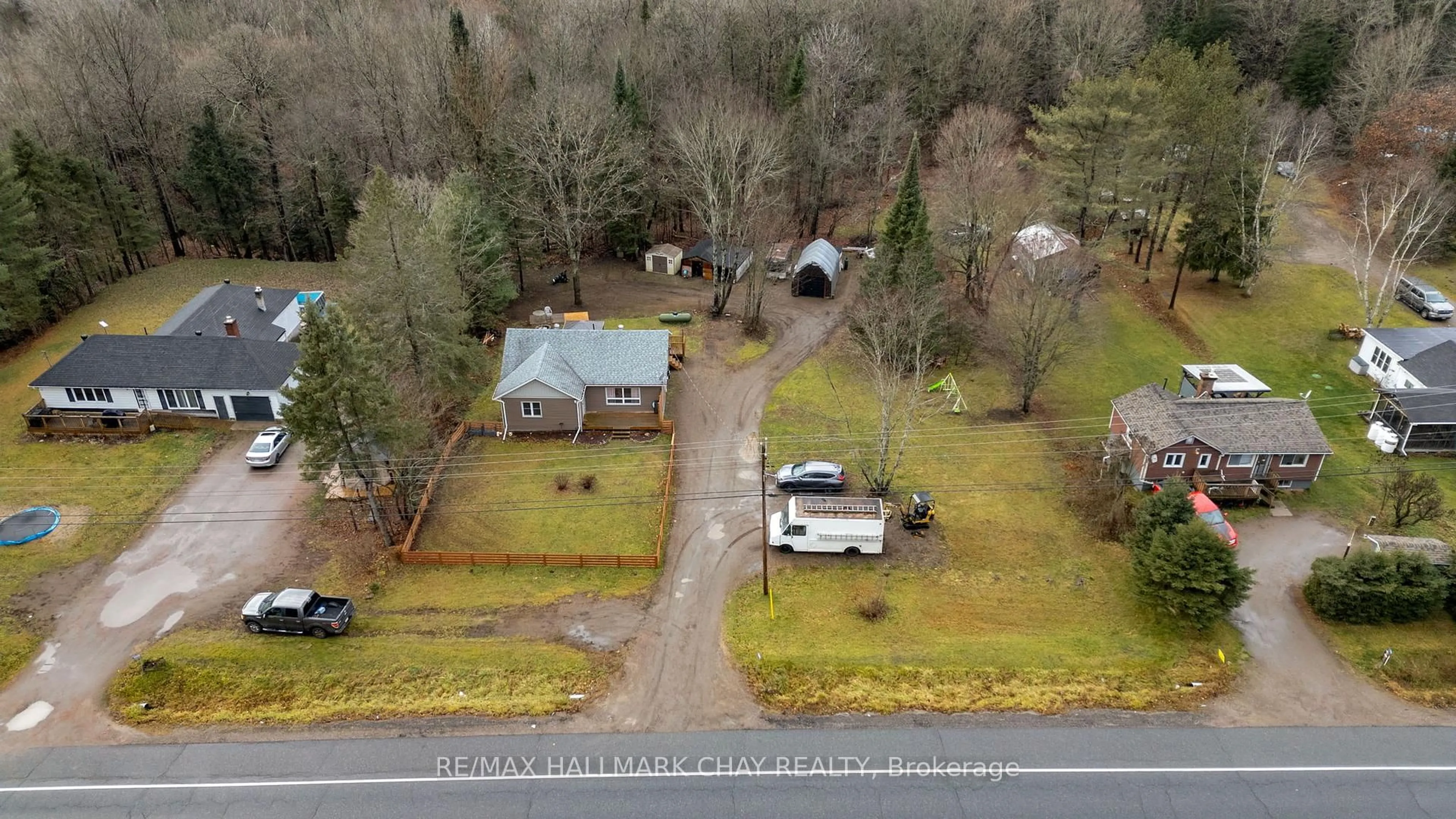 A pic from outside/outdoor area/front of a property/back of a property/a pic from drone, street for 13045 Highway 35 Highway, Minden Hills Ontario K0M 2K0