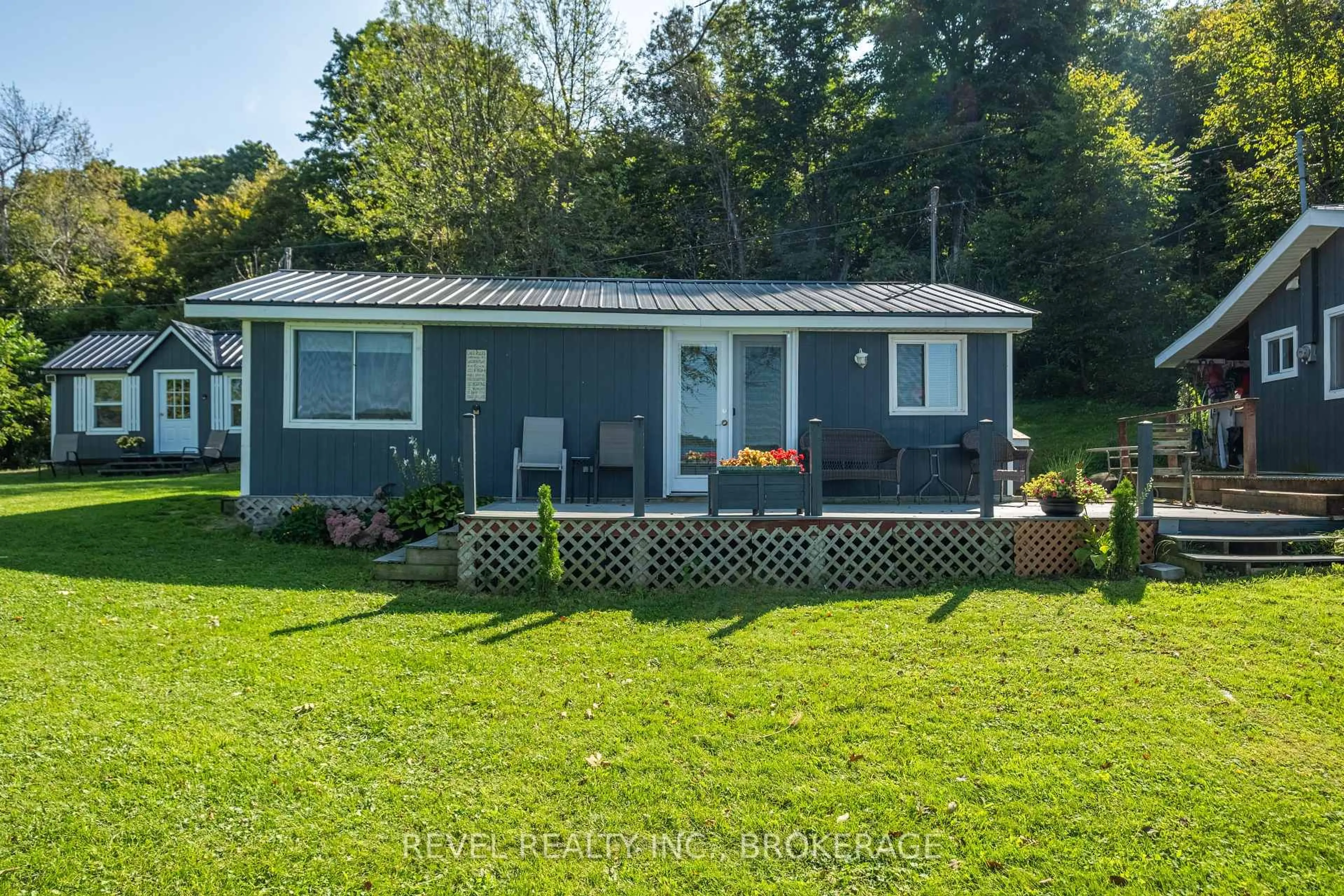 A pic from outside/outdoor area/front of a property/back of a property/a pic from drone, water/lake/river/ocean view for 178 Alarie Lane, Wolfe Island Ontario K0H 2Y0