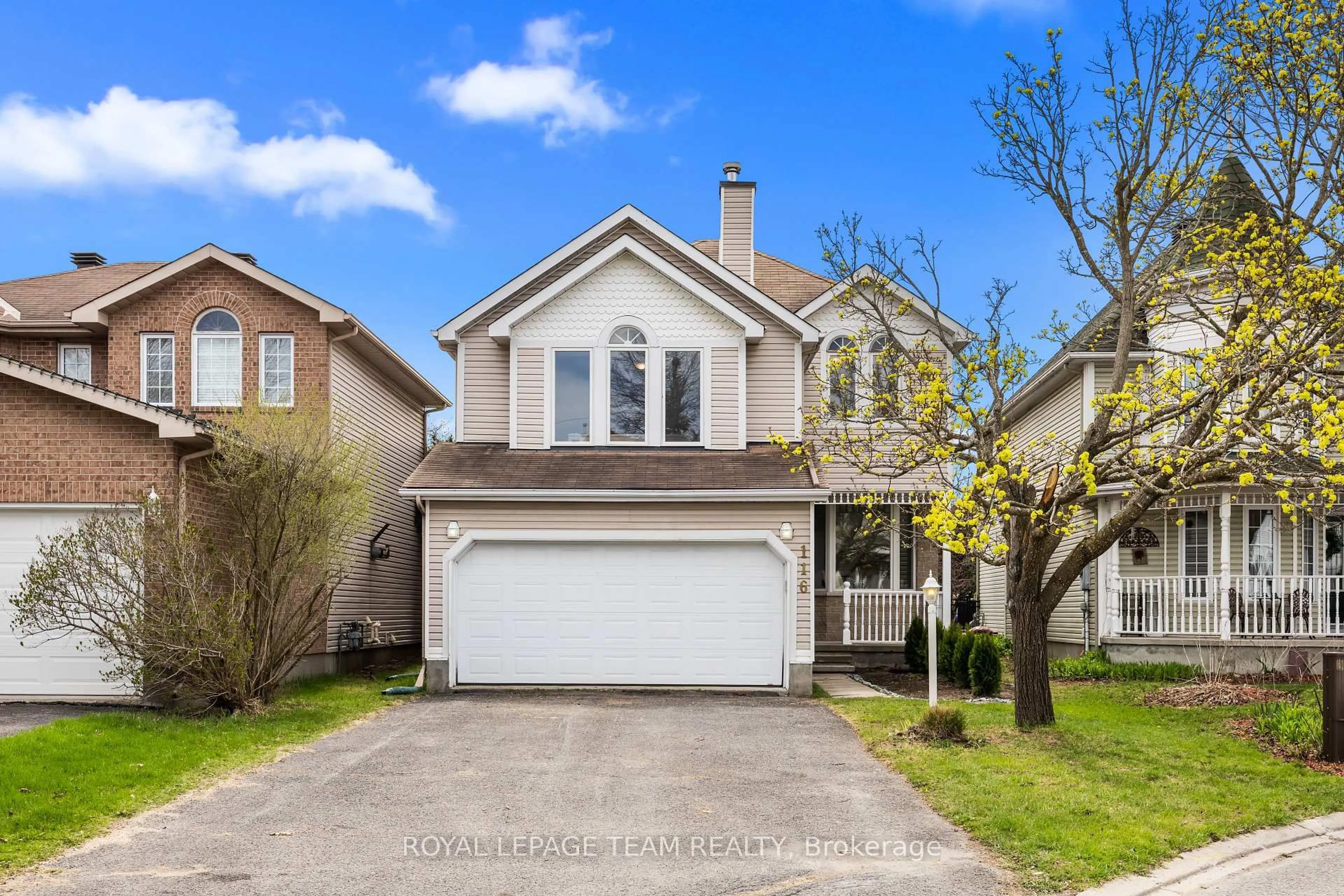 Home with vinyl exterior material, street for 116 Woodgate Way, Ottawa Ontario K2J 4E5