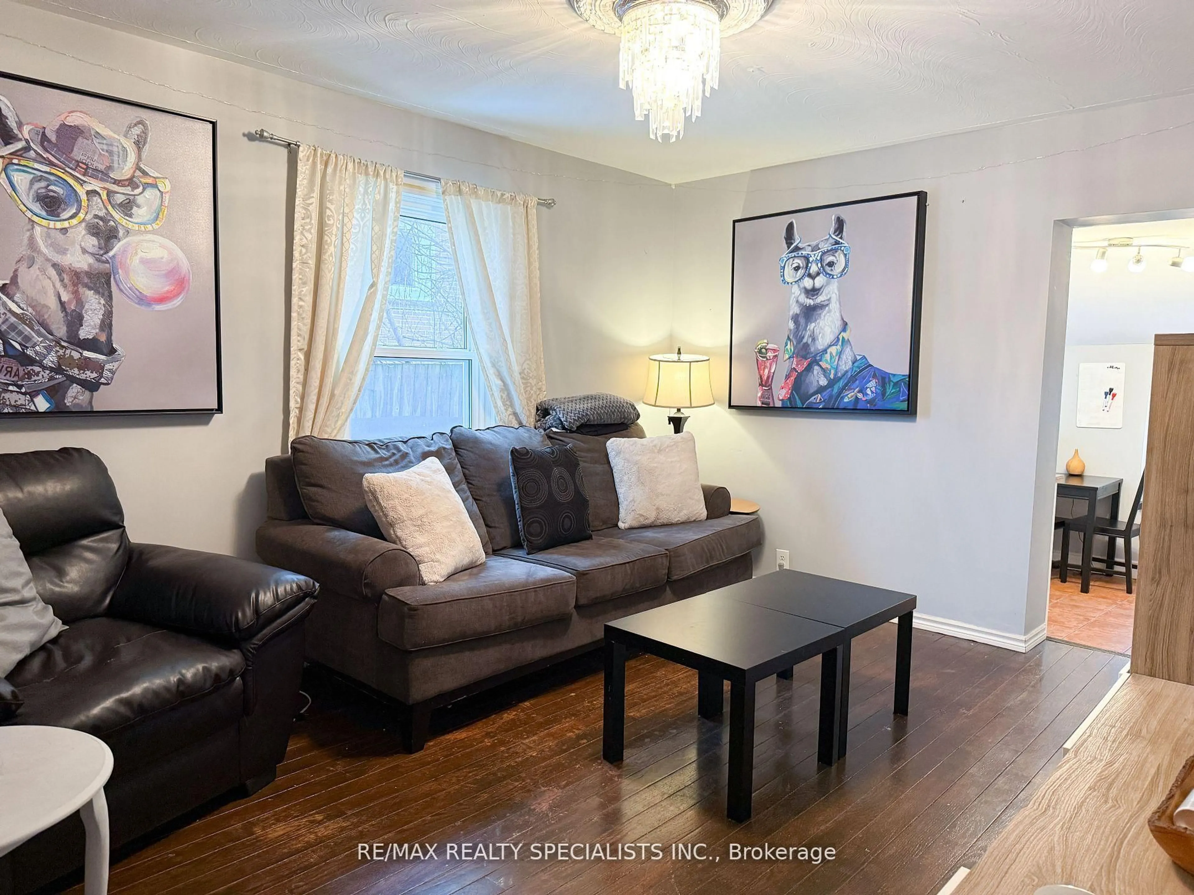 Living room with furniture, wood/laminate floor for 434 Division St, Kingston Ontario K7K 4A9