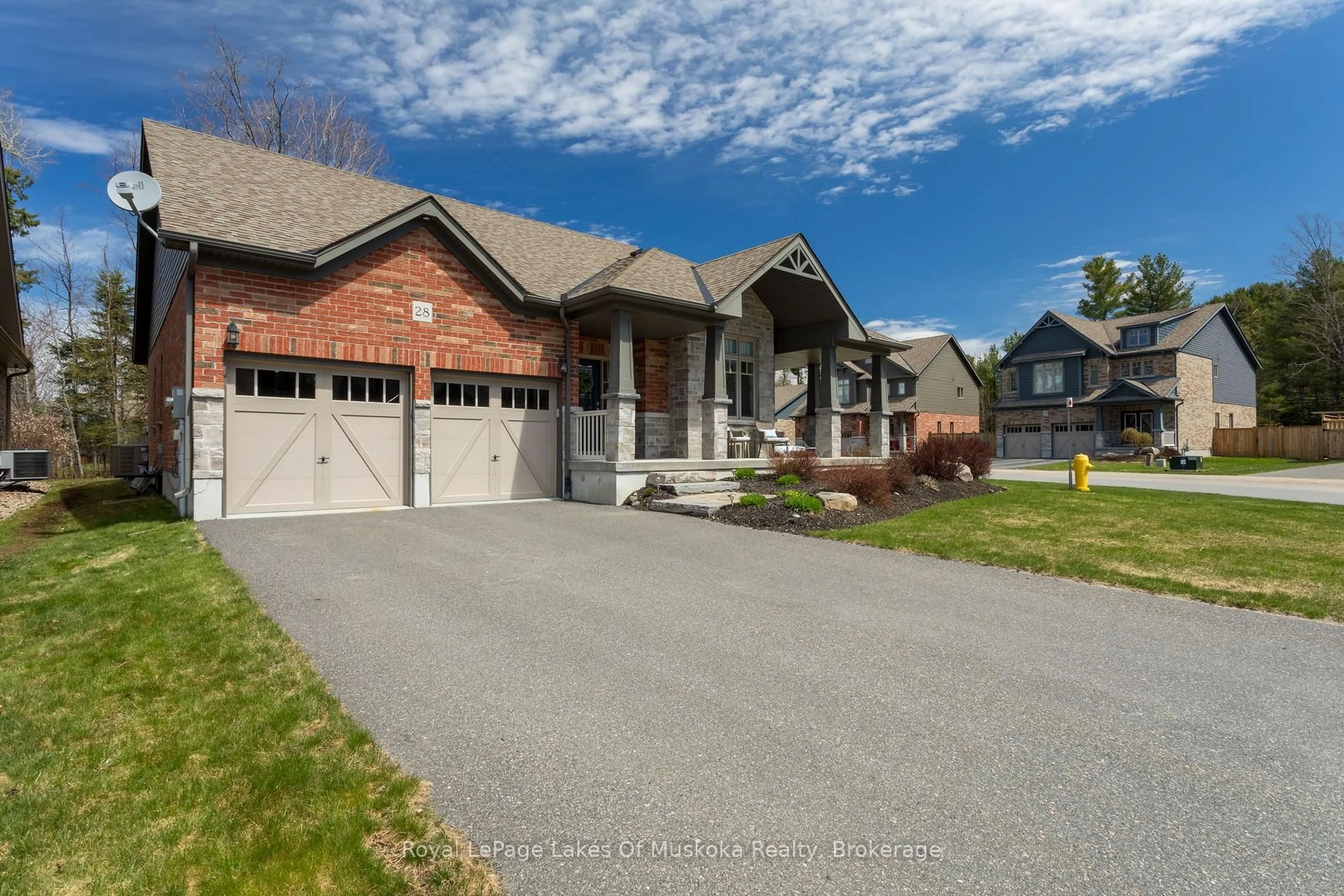 Home with brick exterior material, street for 28 Prestwick Dr, Huntsville Ontario P1H 0C2
