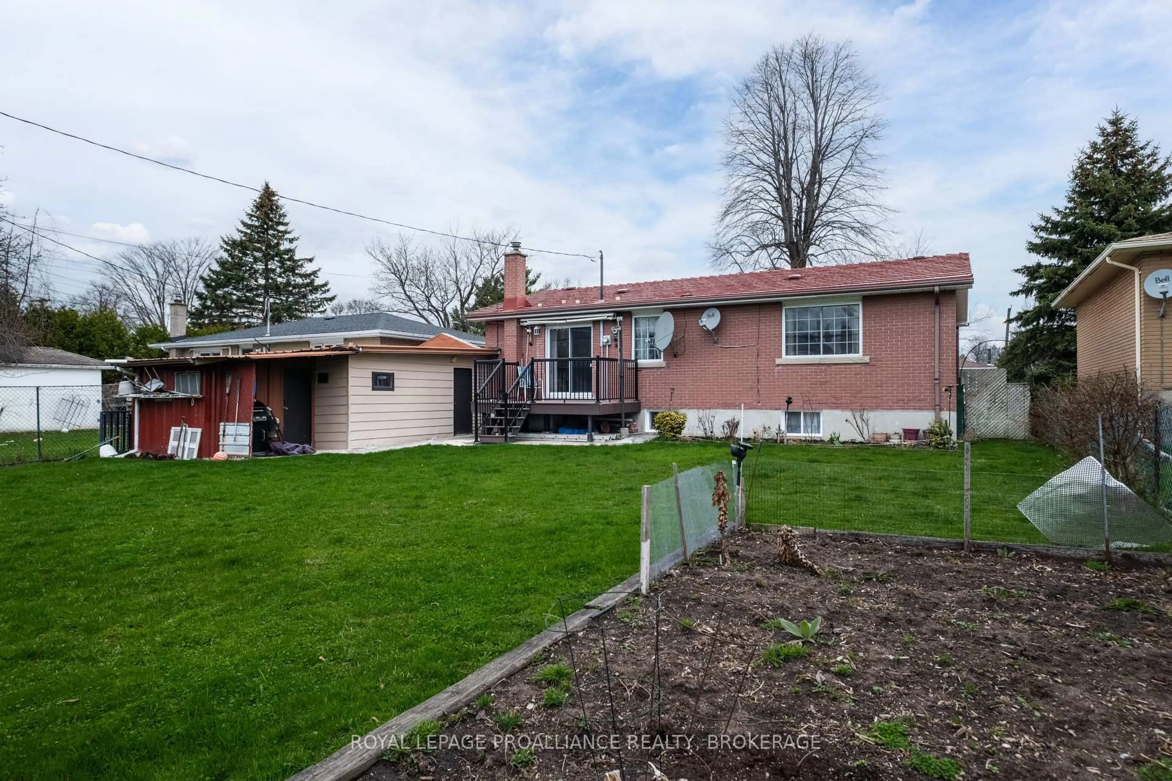 A pic from outside/outdoor area/front of a property/back of a property/a pic from drone, street for 56 Campbell Cres, Kingston Ontario K7M 1Z5