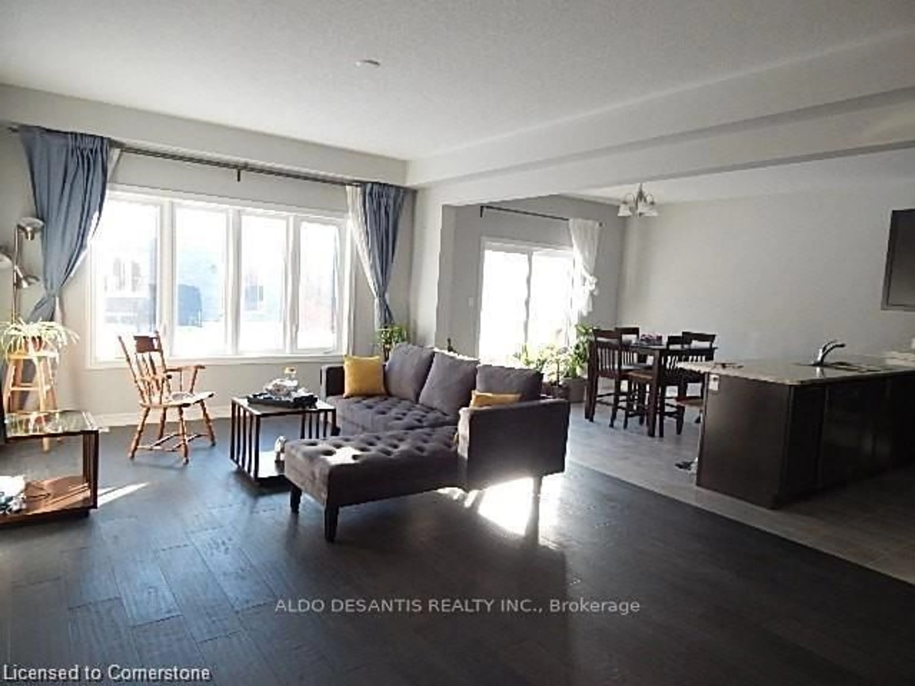 Living room with furniture, wood/laminate floor for 278 Dalgleish Tr, Hamilton Ontario L0R 1P0