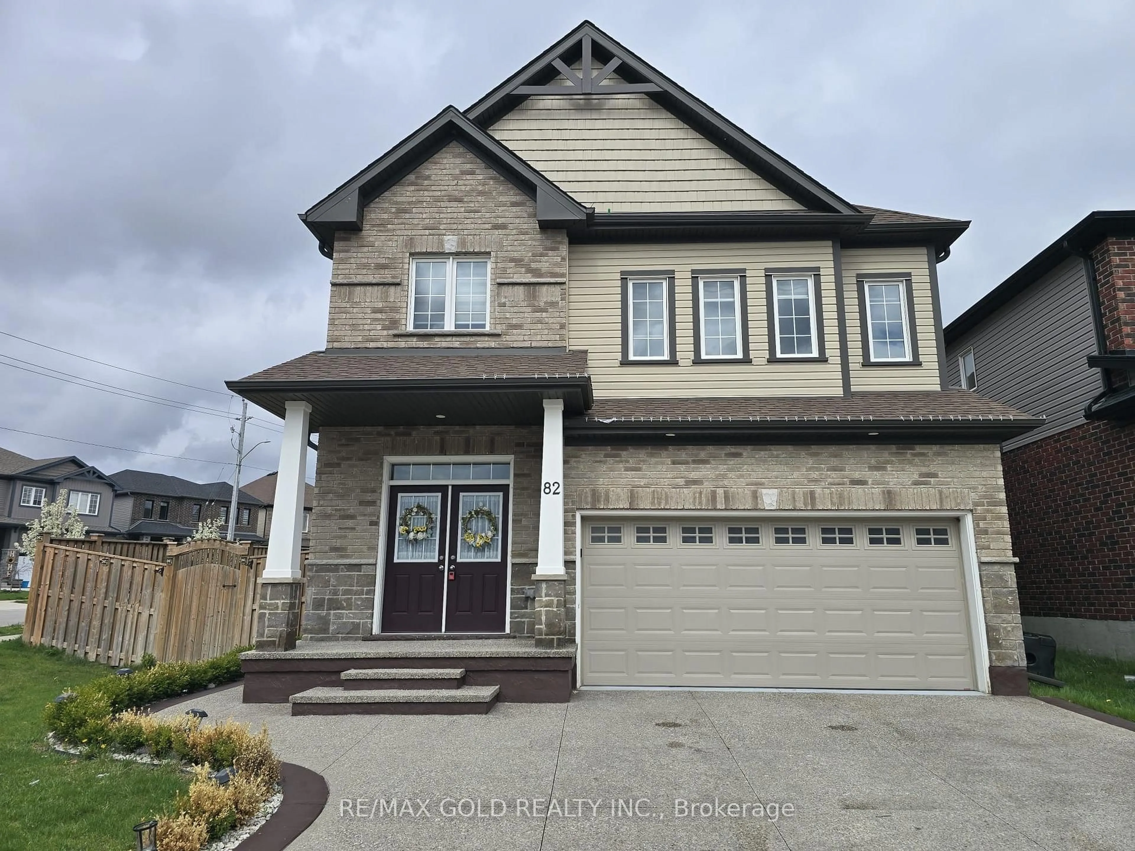 Home with brick exterior material, street for 82 Castlebay St, Kitchener Ontario N2R 1W6