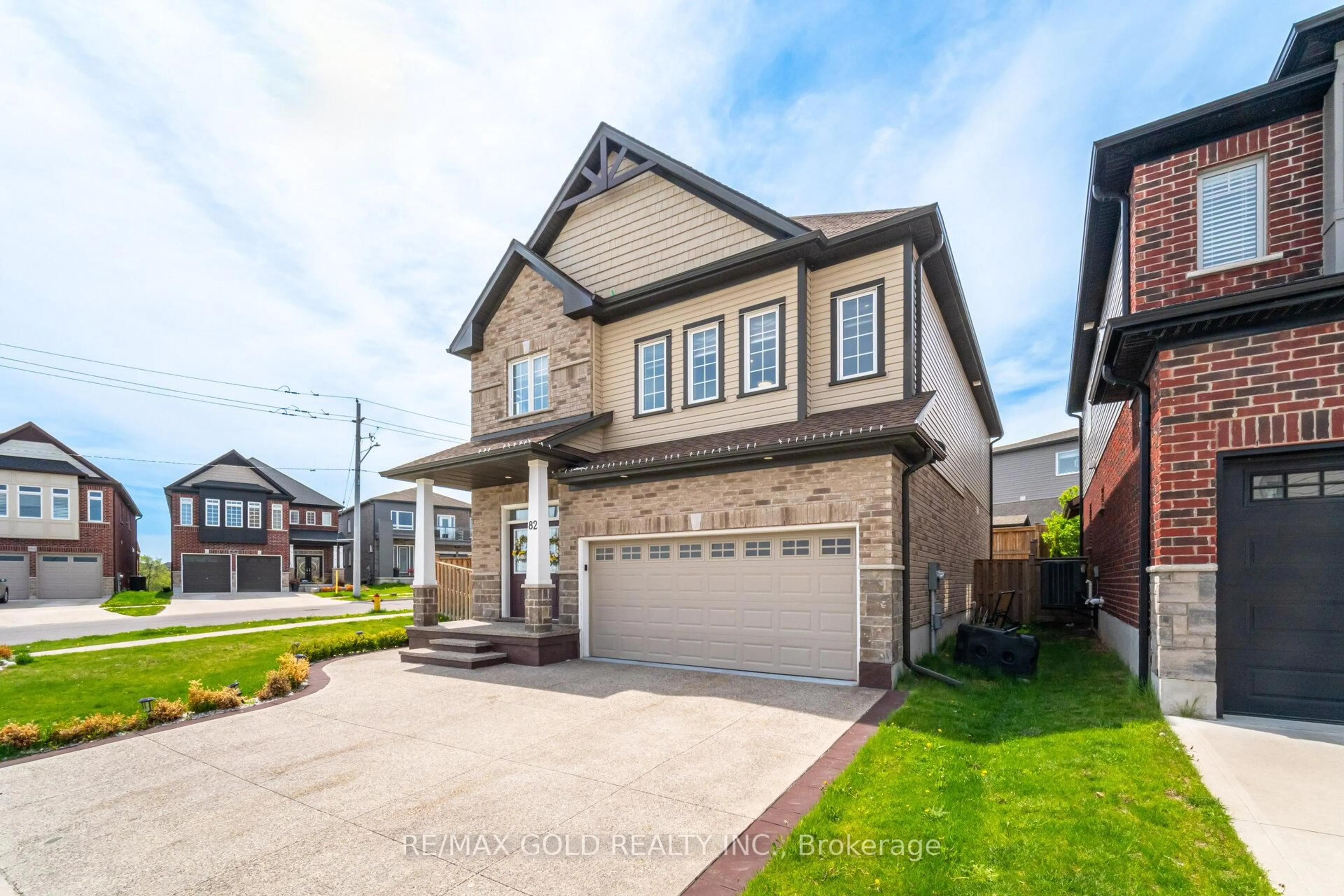 Home with brick exterior material, street for 82 Castlebay St, Kitchener Ontario N2R 1W6