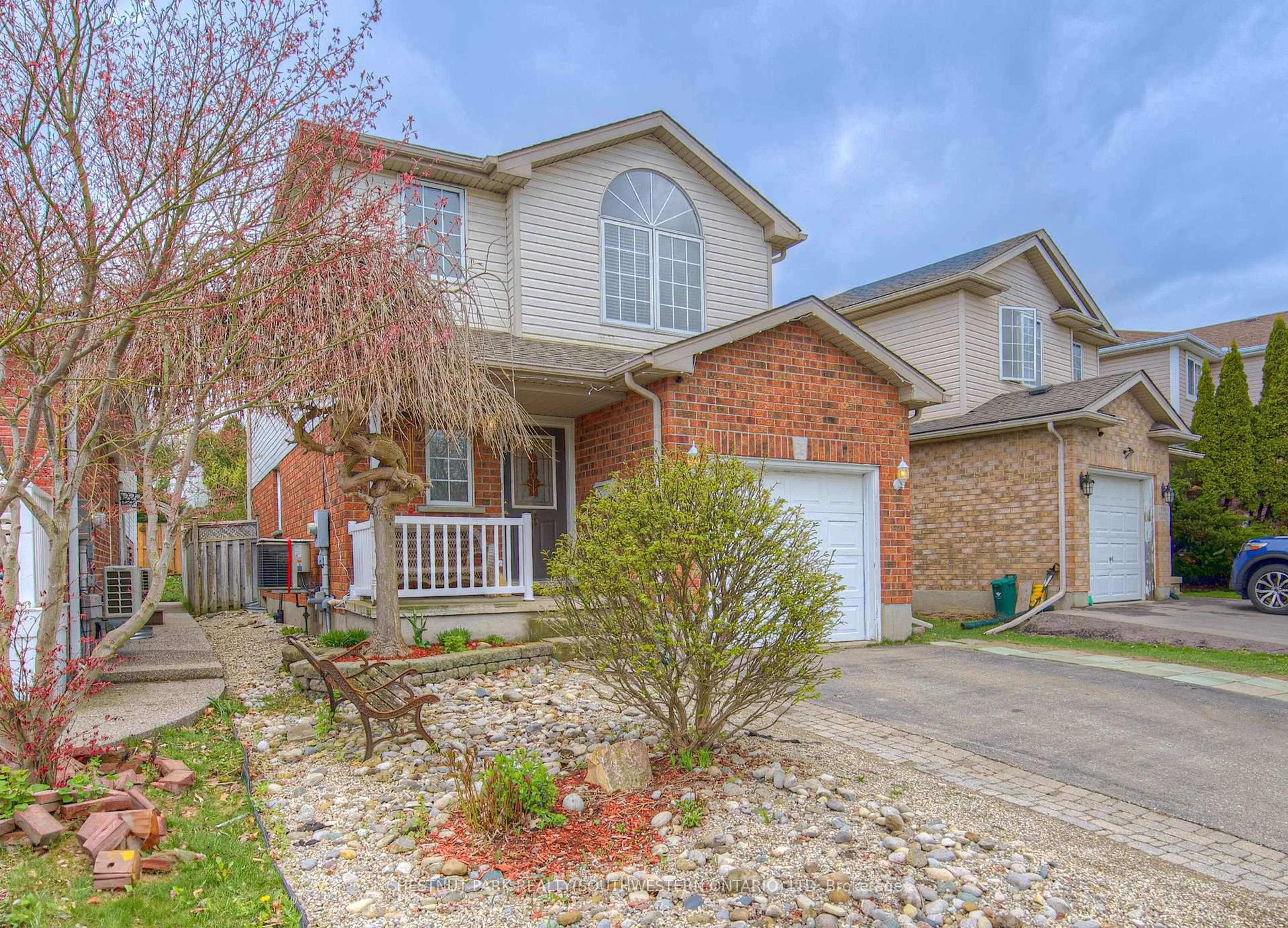 Home with brick exterior material, street for 345 Keewatin Ave, Kitchener Ontario N2B 3W2