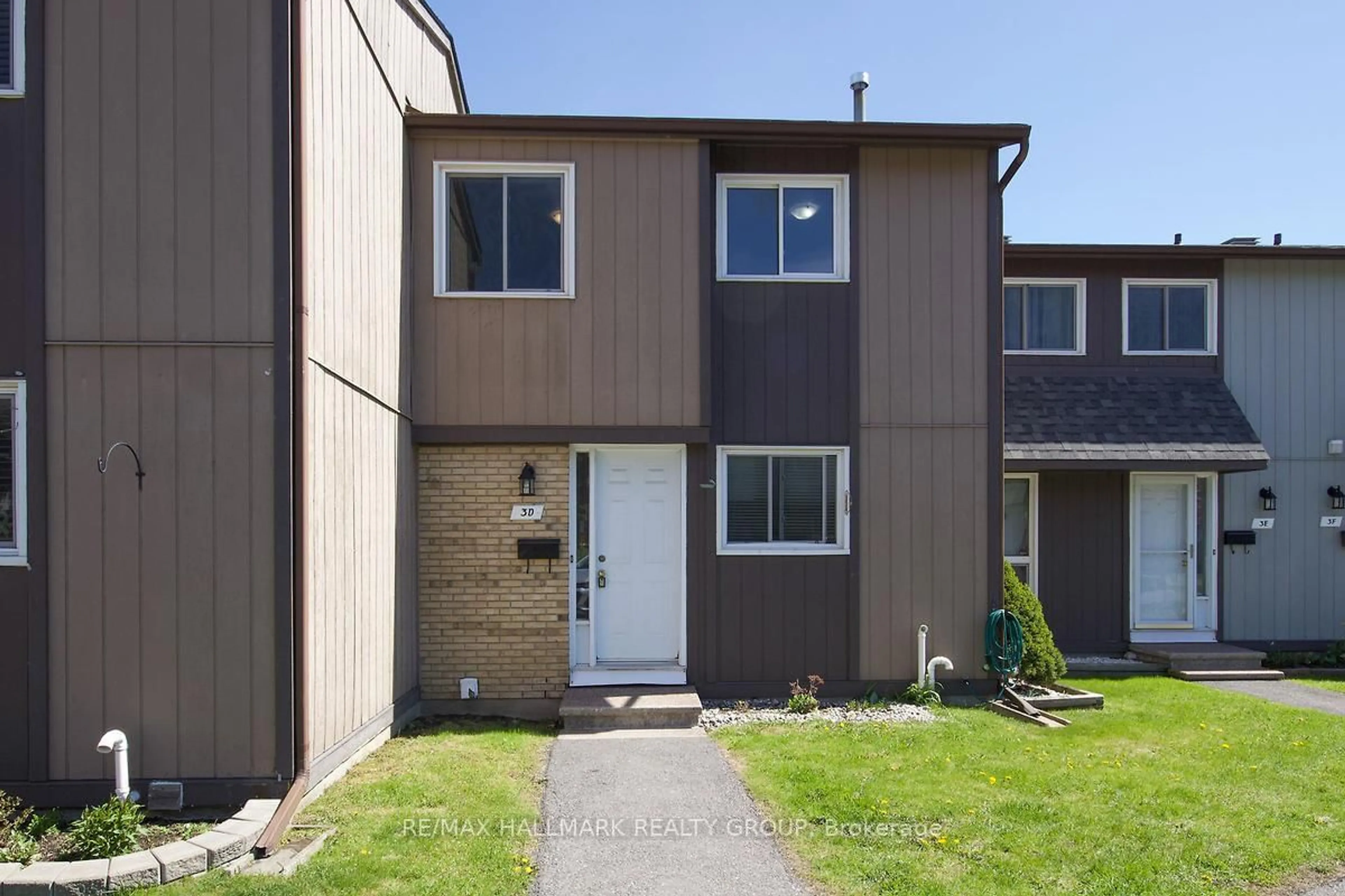 Home with vinyl exterior material, street for 3 Spring Grove Lane #D, Barrhaven Ontario K2J 2C5