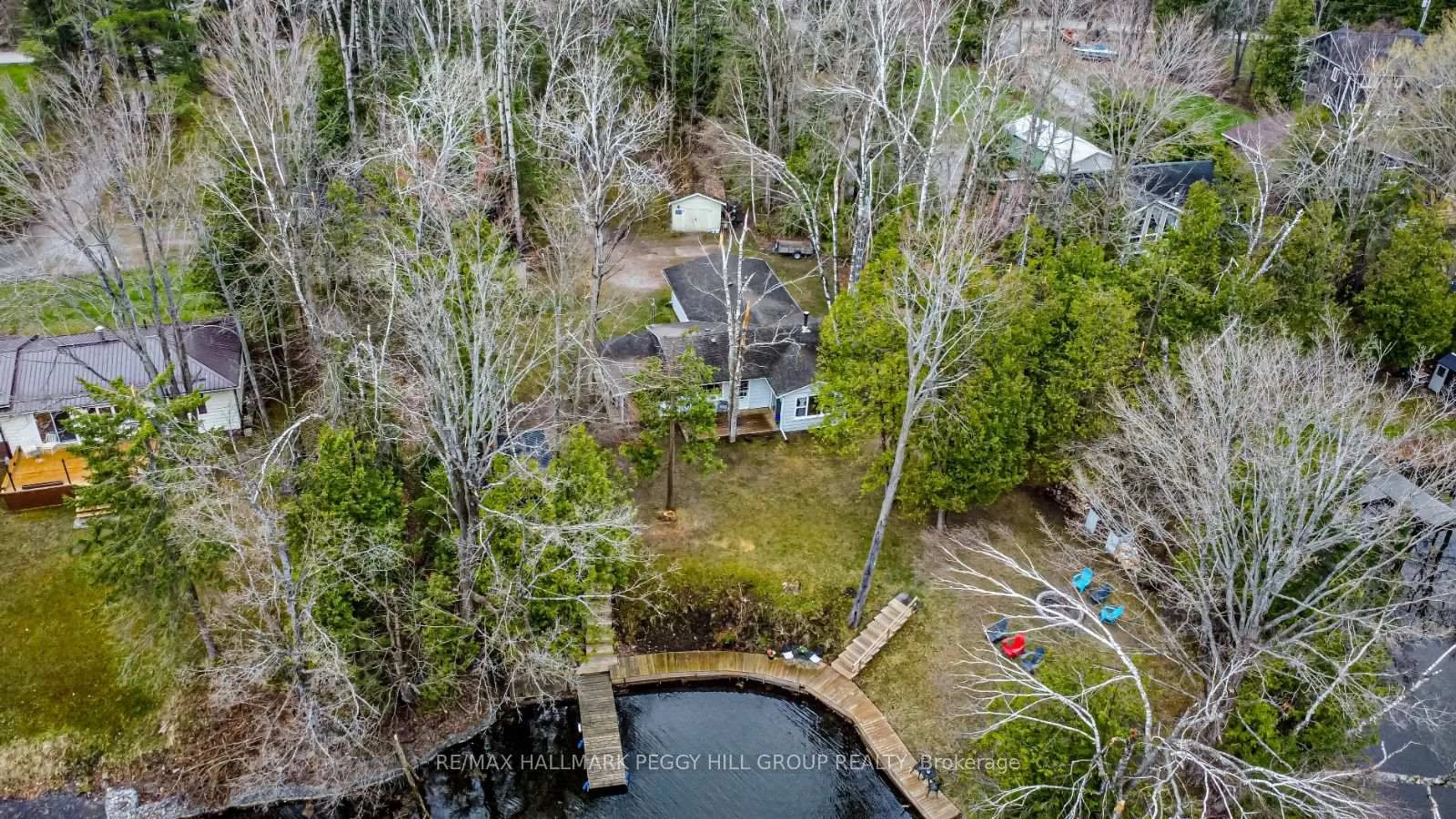 A pic from outside/outdoor area/front of a property/back of a property/a pic from drone, water/lake/river/ocean view for 15 Duncan Dr, Kawartha Lakes Ontario K0M 1B0