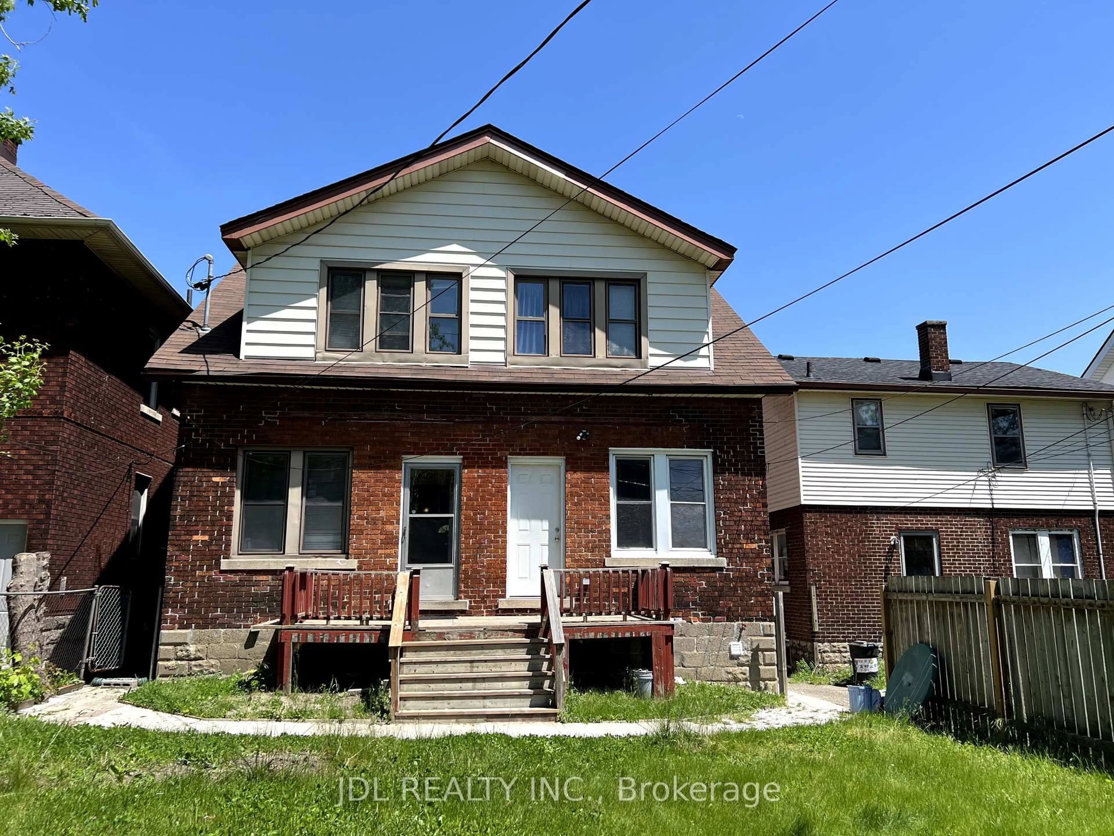 Home with brick exterior material, building for 703-705 Partington Ave, Windsor Ontario N9B 2N6