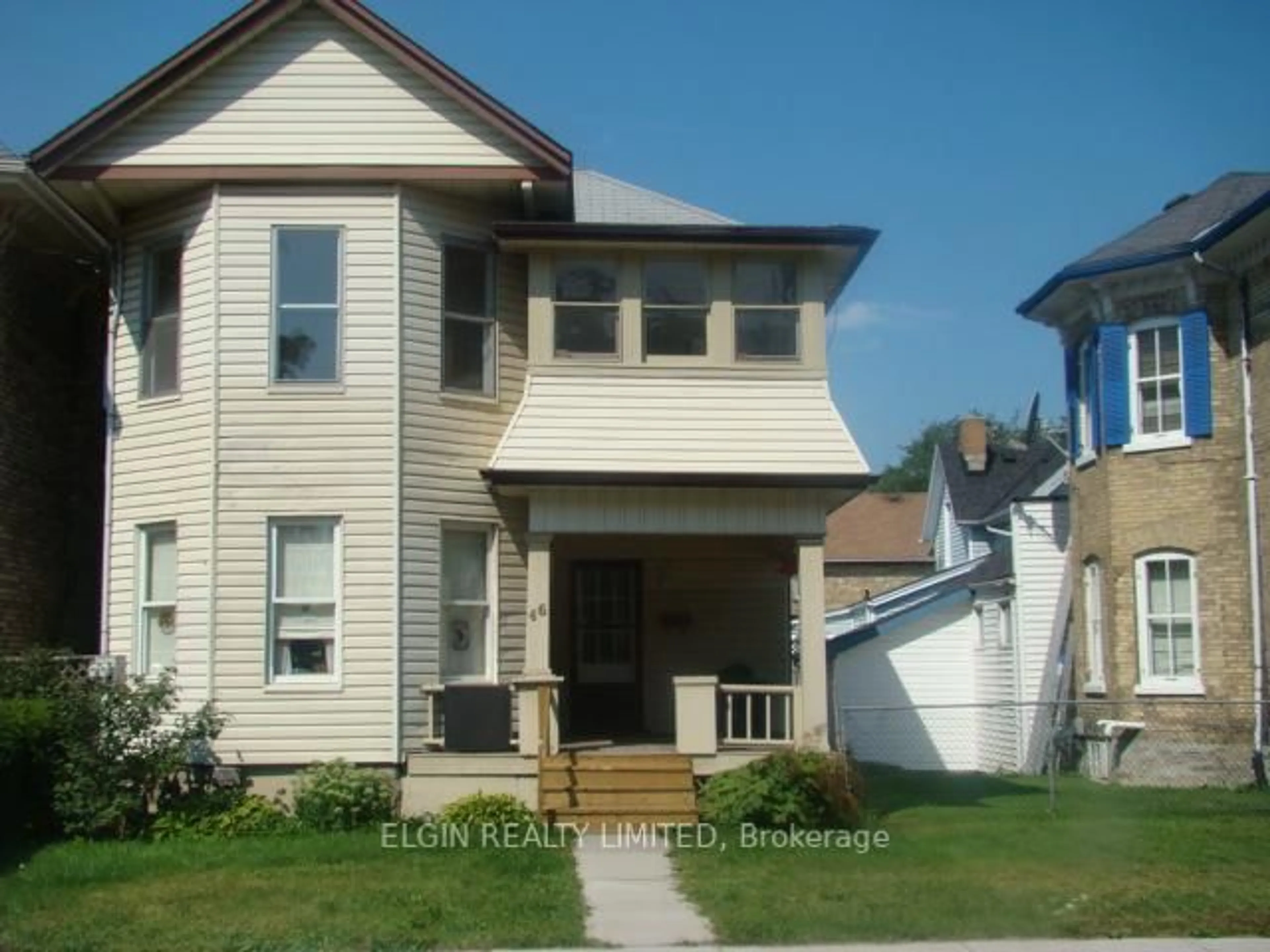 Home with vinyl exterior material, street for 46 Elgin St, St. Thomas Ontario N5R 3M1