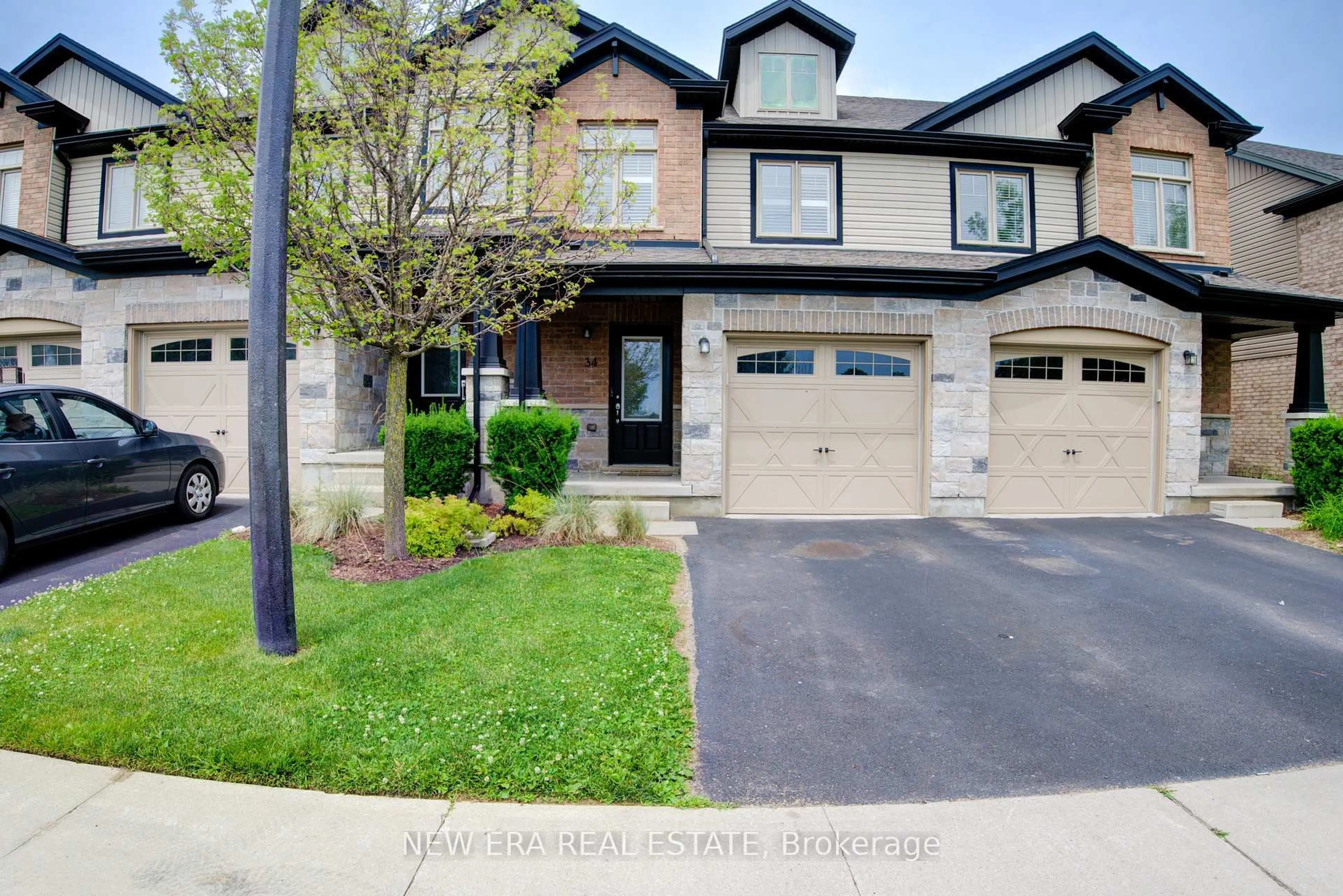 Home with brick exterior material, street for 34 Arlington Cres, Guelph Ontario N1L 0L1