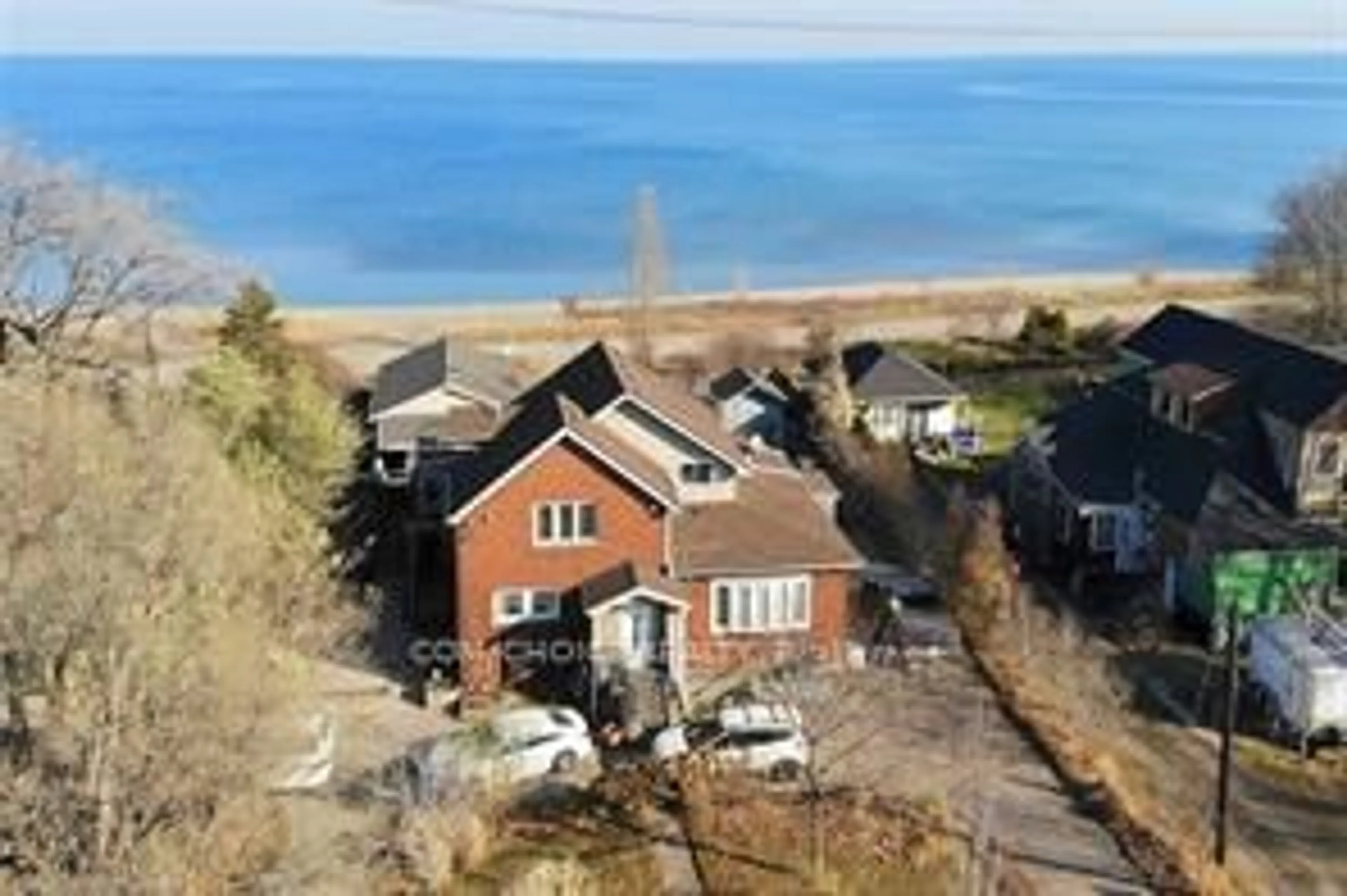 A pic from outside/outdoor area/front of a property/back of a property/a pic from drone, water/lake/river/ocean view for 645 Beach Blvd, Hamilton Ontario L8H 6X8