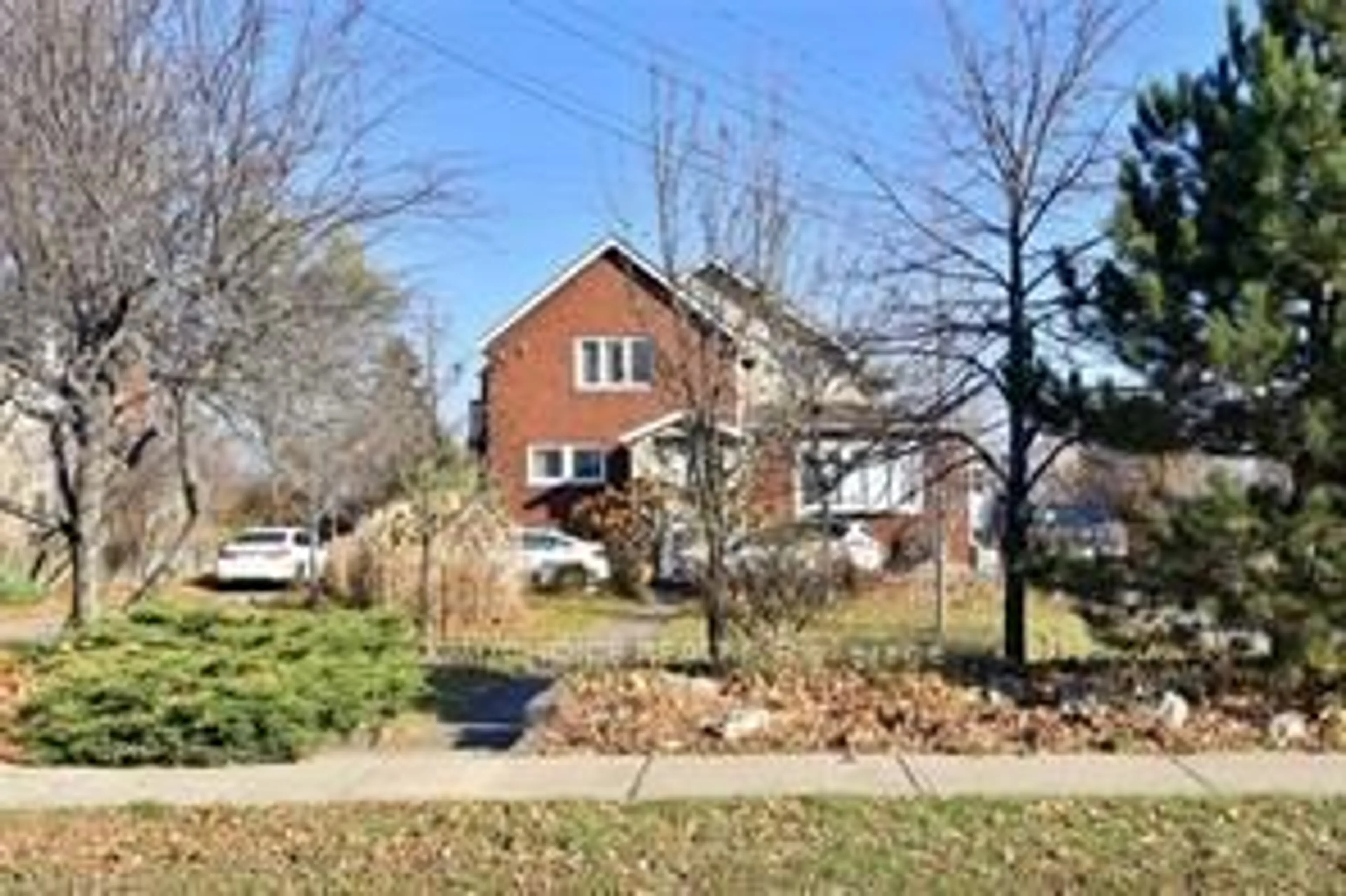 Home with brick exterior material, street for 645 Beach Blvd, Hamilton Ontario L8H 6X8