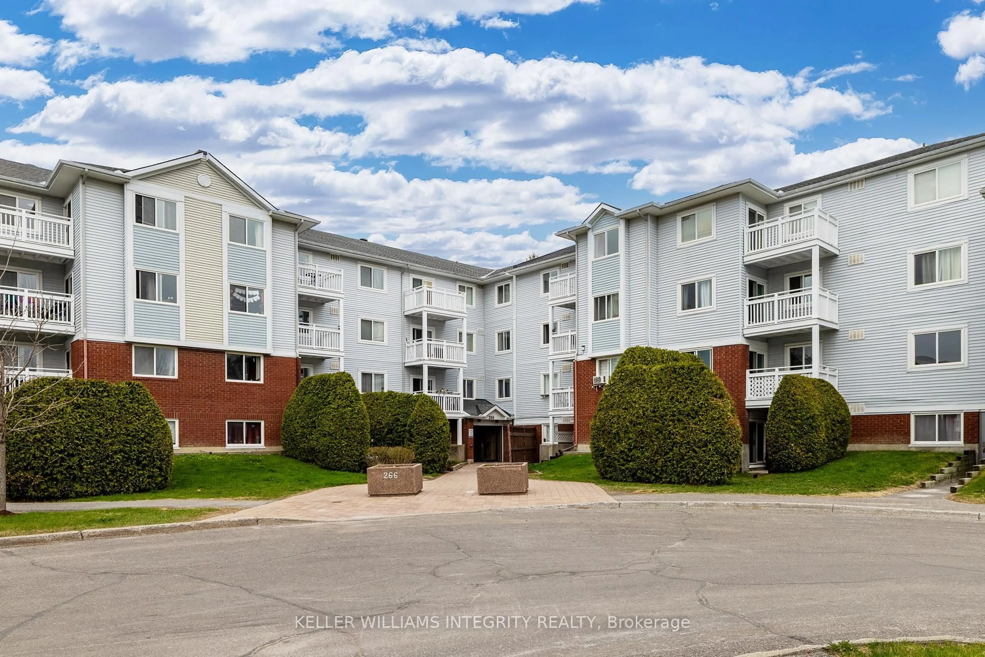 A pic from outside/outdoor area/front of a property/back of a property/a pic from drone, unknown for 266 Lorry Greenberg Dr #1, Ottawa Ontario K1T 3J9
