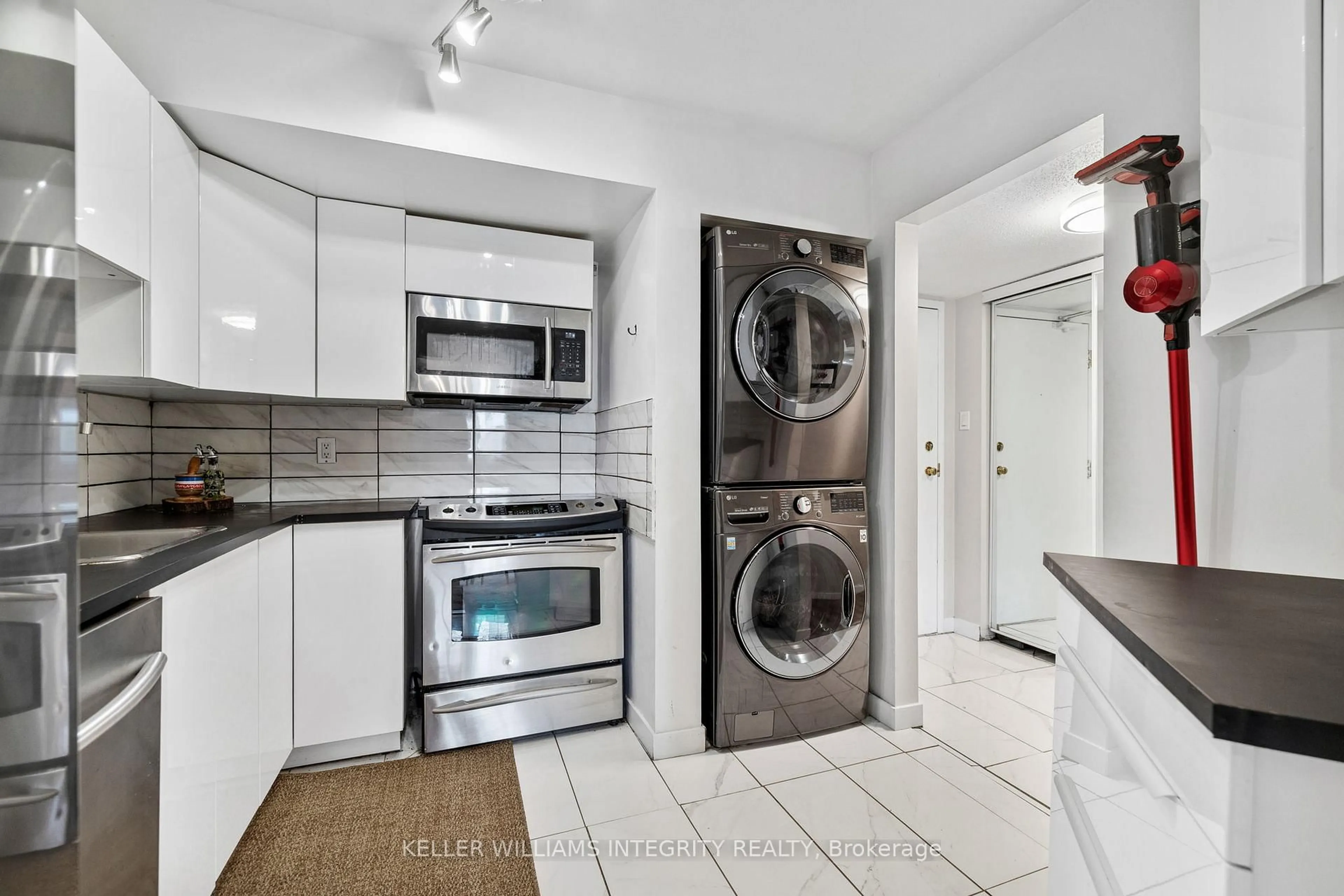Kitchen with laundary machines, unknown for 266 Lorry Greenberg Dr #1, Ottawa Ontario K1T 3J9