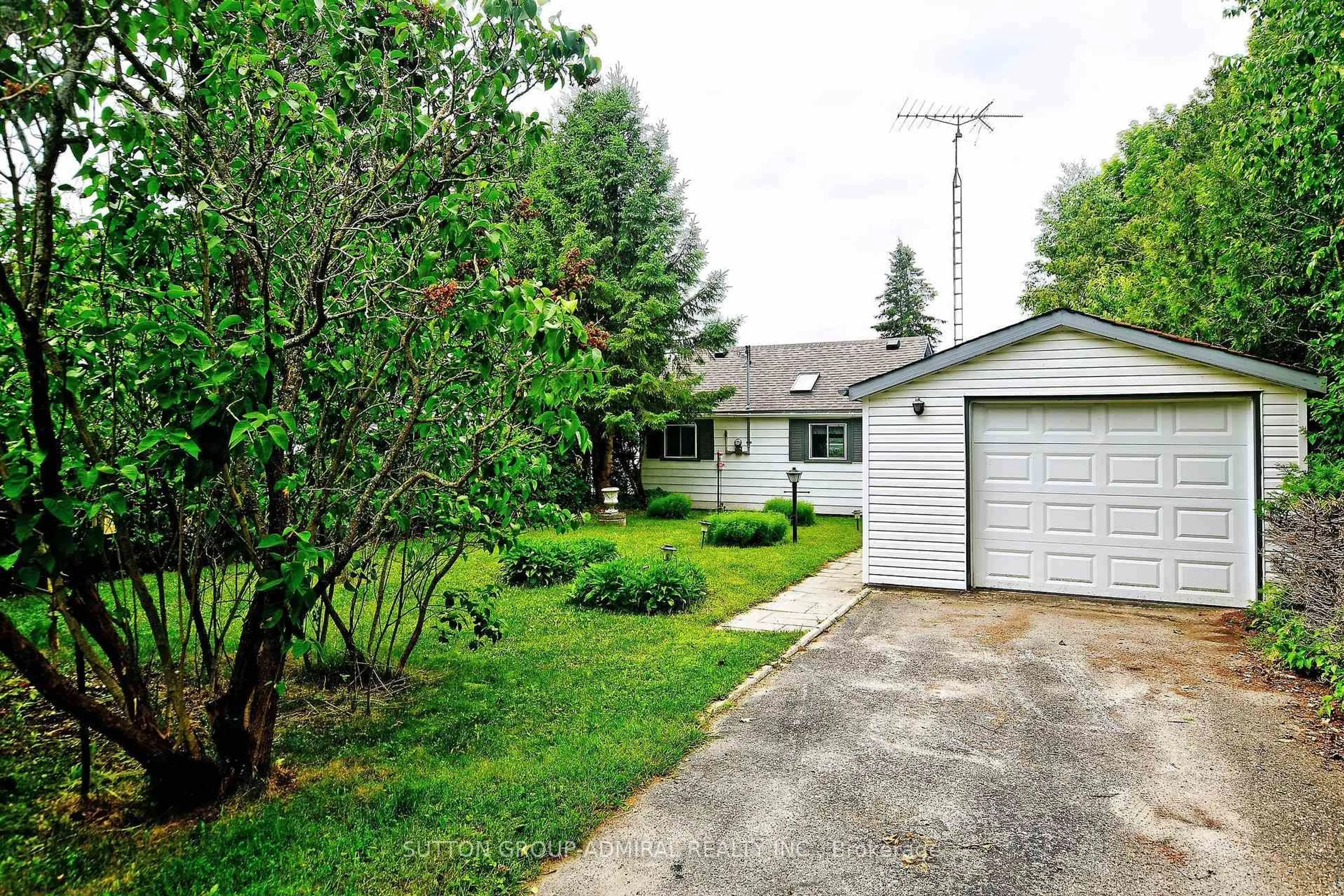 A pic from outside/outdoor area/front of a property/back of a property/a pic from drone, street for 70 Antiquary Rd, Kawartha Lakes Ontario K0M 2B0