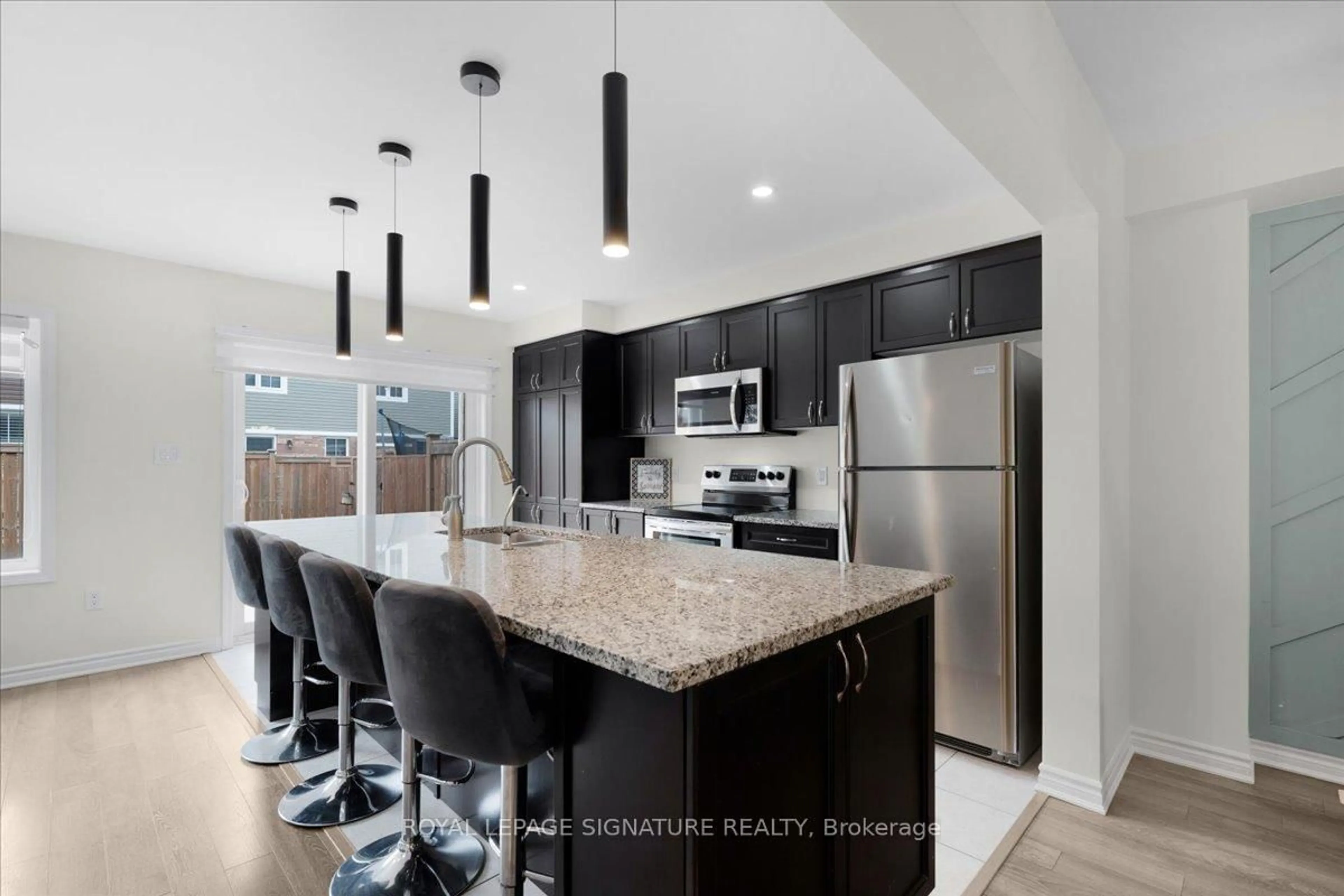 Open concept kitchen, ceramic/tile floor for 143 Ridge Rd #105, Cambridge Ontario N3E 0E1