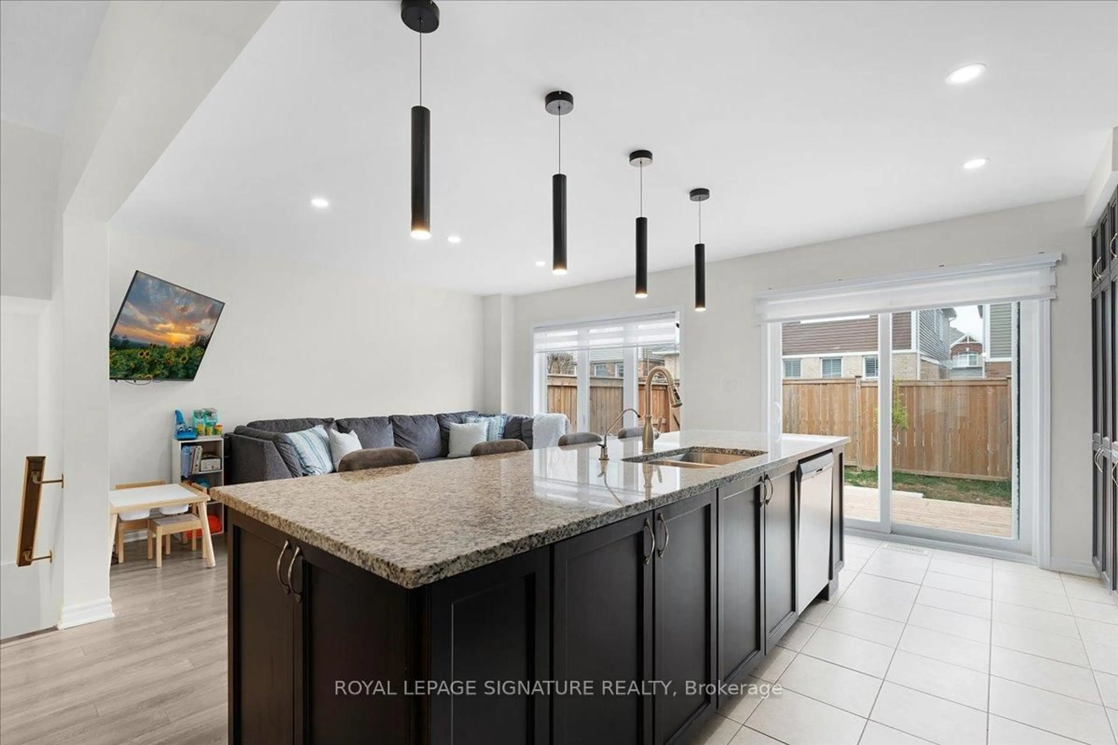 Open concept kitchen, ceramic/tile floor for 143 Ridge Rd #105, Cambridge Ontario N3E 0E1