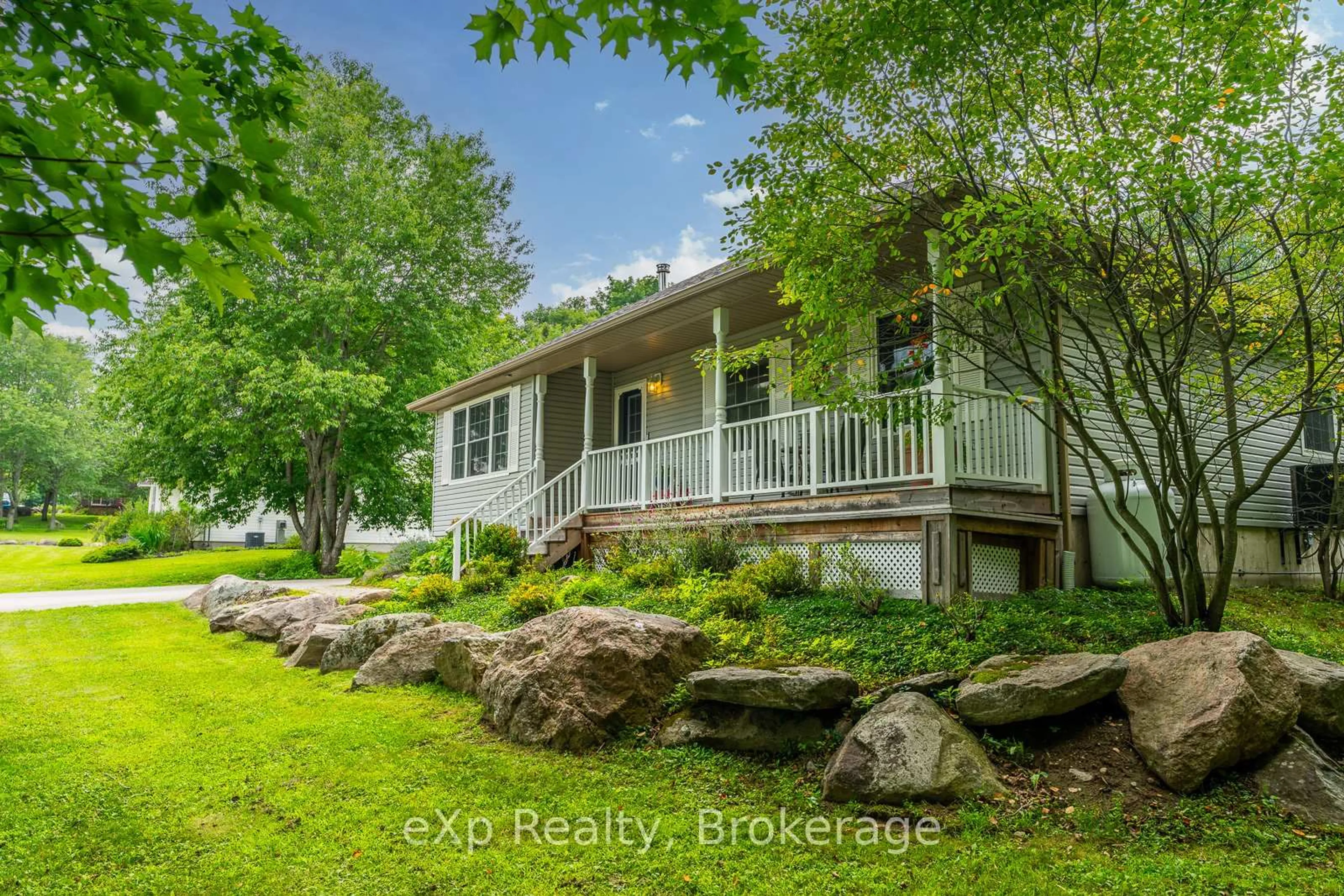 A pic from outside/outdoor area/front of a property/back of a property/a pic from drone, water/lake/river/ocean view for 45 Sancayne St, Dysart et al Ontario K0M 1S0