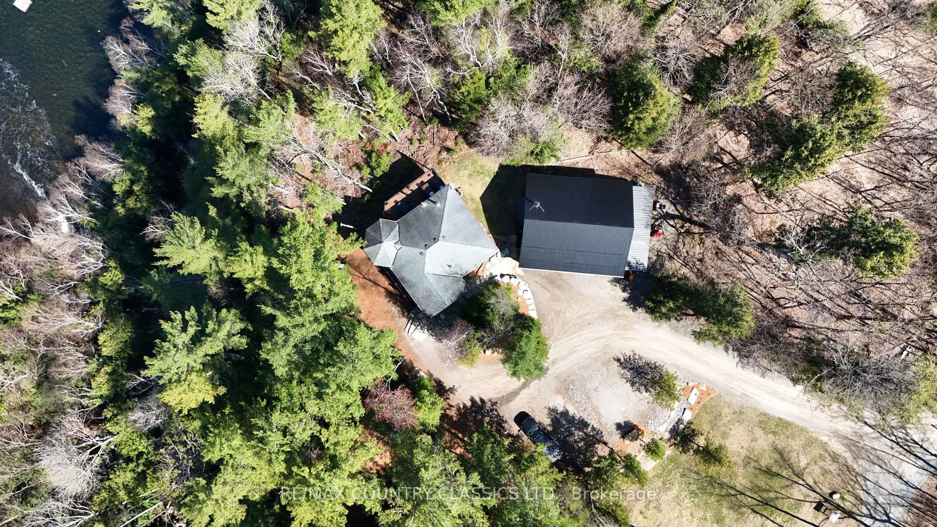 A pic from outside/outdoor area/front of a property/back of a property/a pic from drone, forest/trees view for 322B Lauretta Lane, Bancroft Ontario K0L 1C0