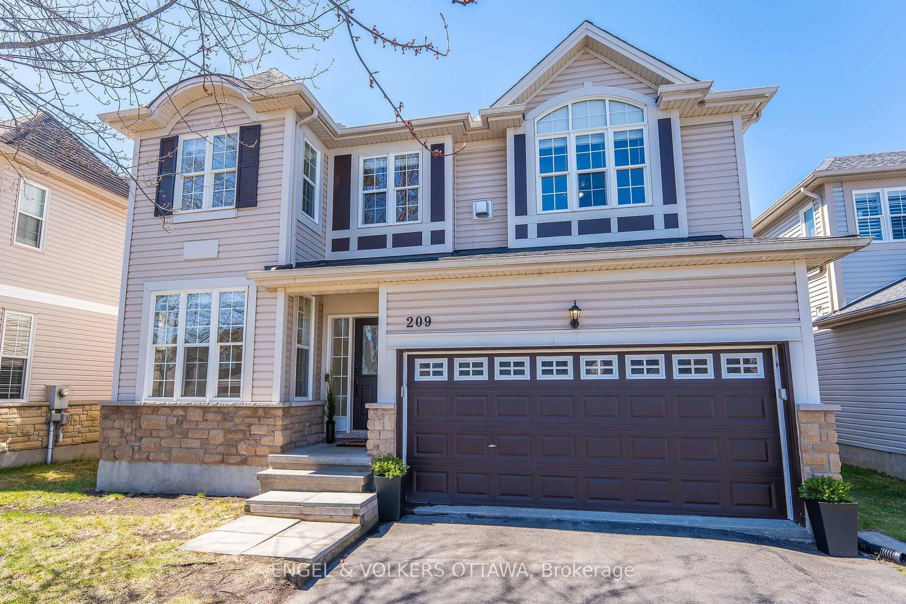 Home with brick exterior material, street for 209 Allgrove Way, Ottawa Ontario K2S 2H7