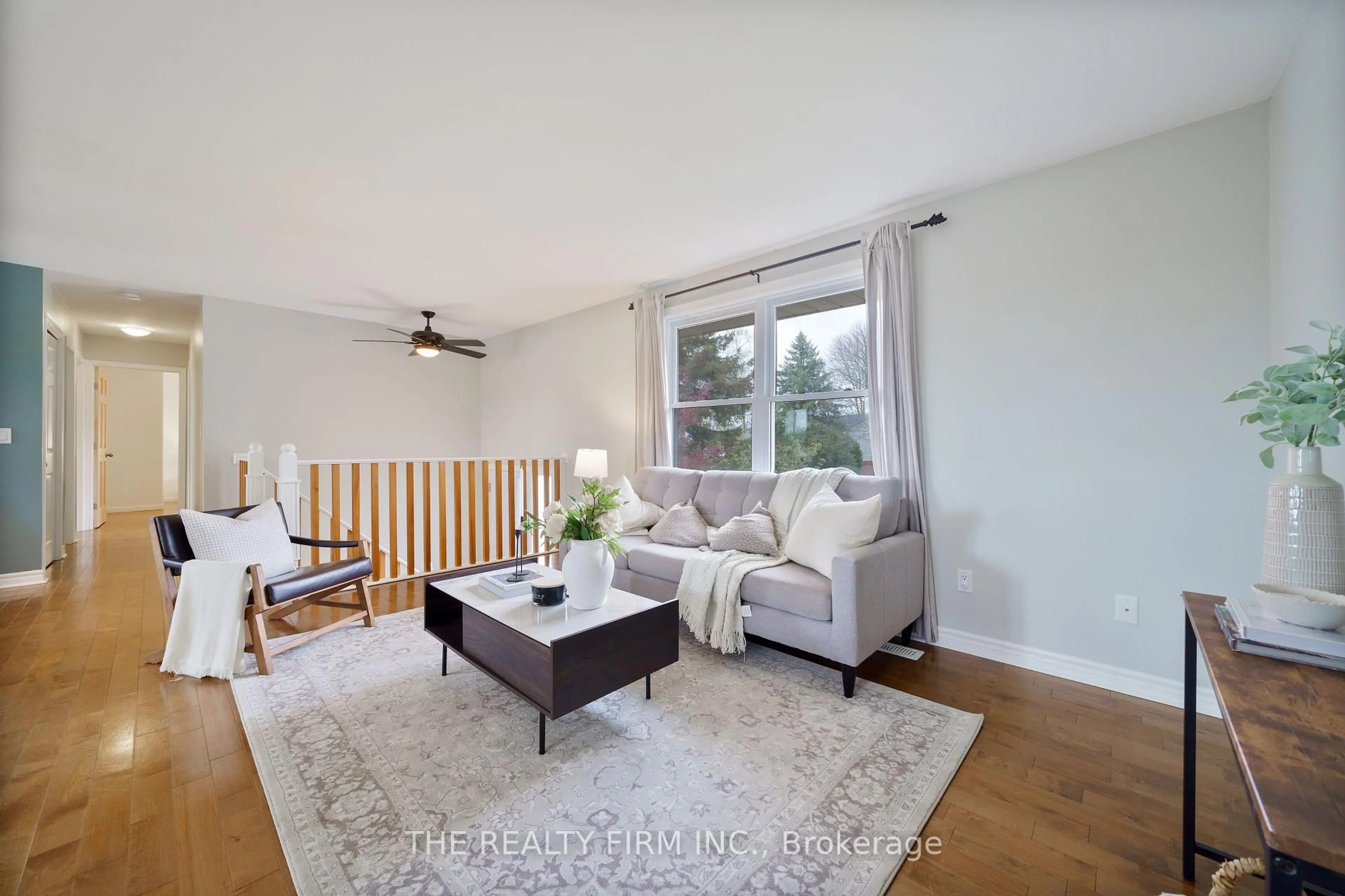 Living room with furniture, wood/laminate floor for 2268 Bentim Rd, Strathroy Caradoc Ontario N0L 1W0