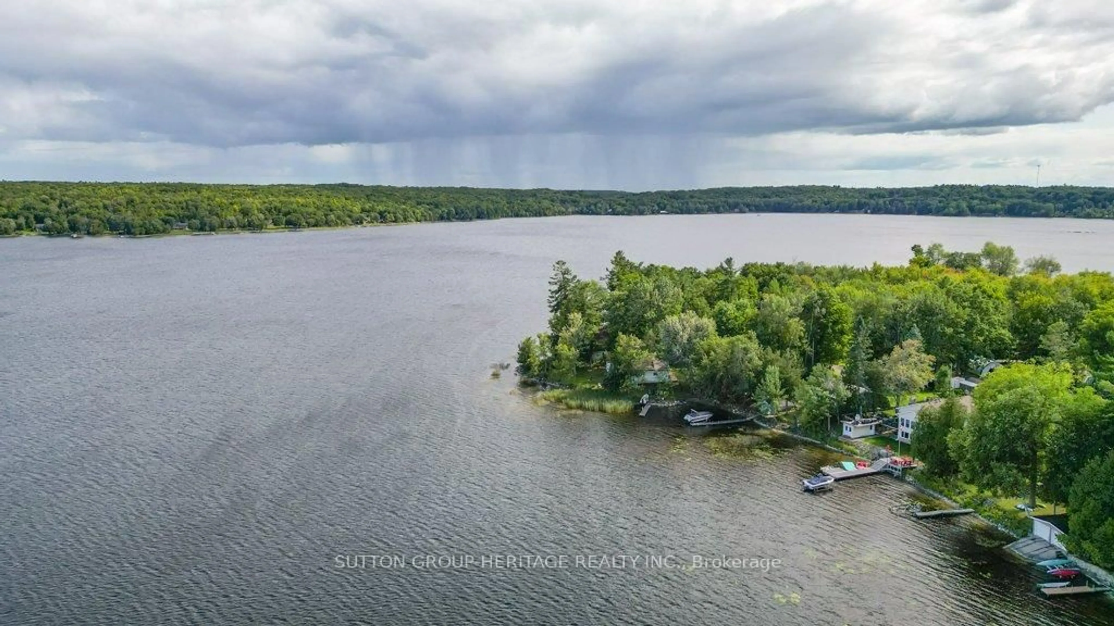 A pic from outside/outdoor area/front of a property/back of a property/a pic from drone, water/lake/river/ocean view for 224 Shoreline Lane, Madoc Ontario K0K 2K0