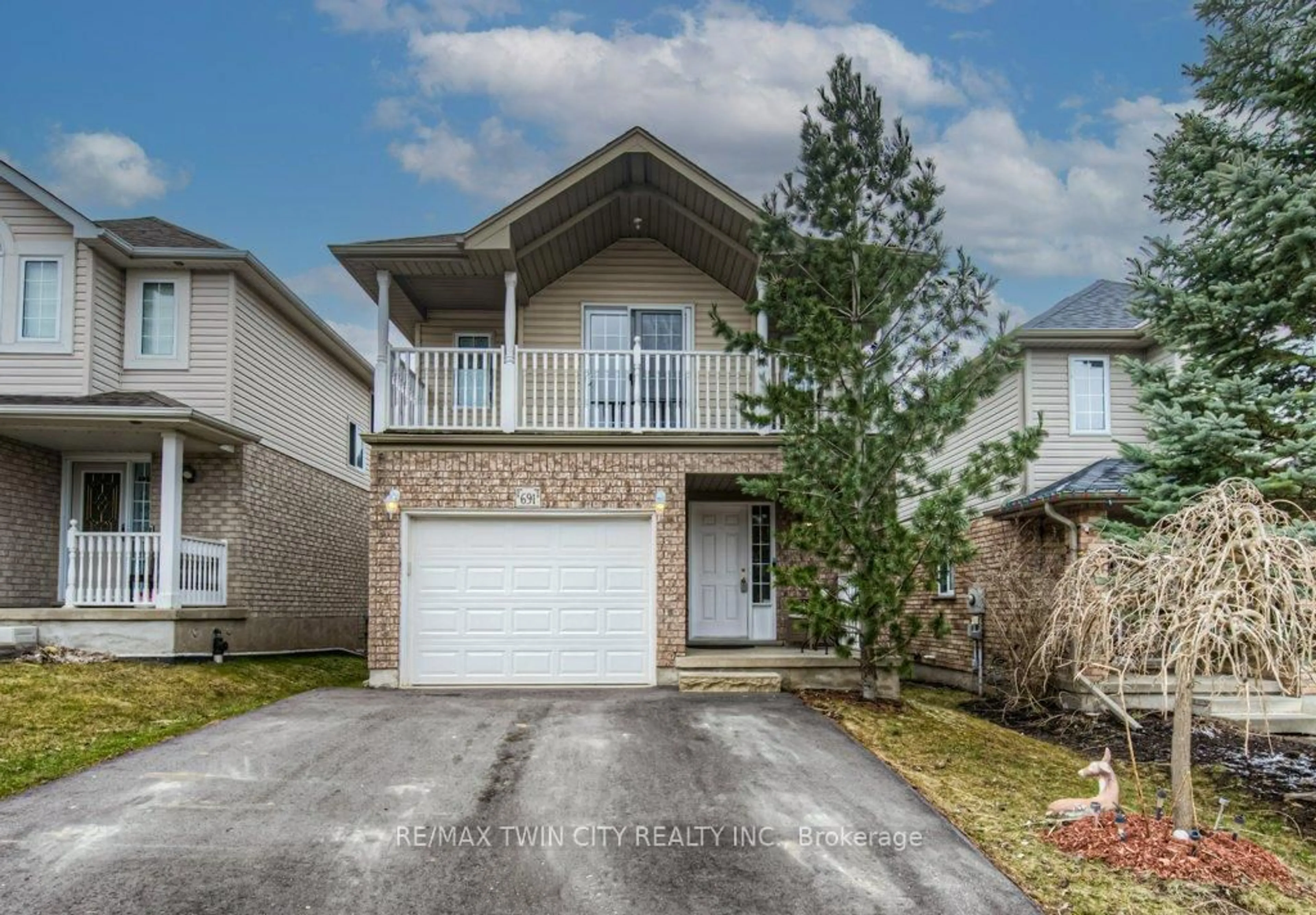 Home with vinyl exterior material, street for 691 Karlsfeld Rd, Waterloo Ontario N2T 2V3