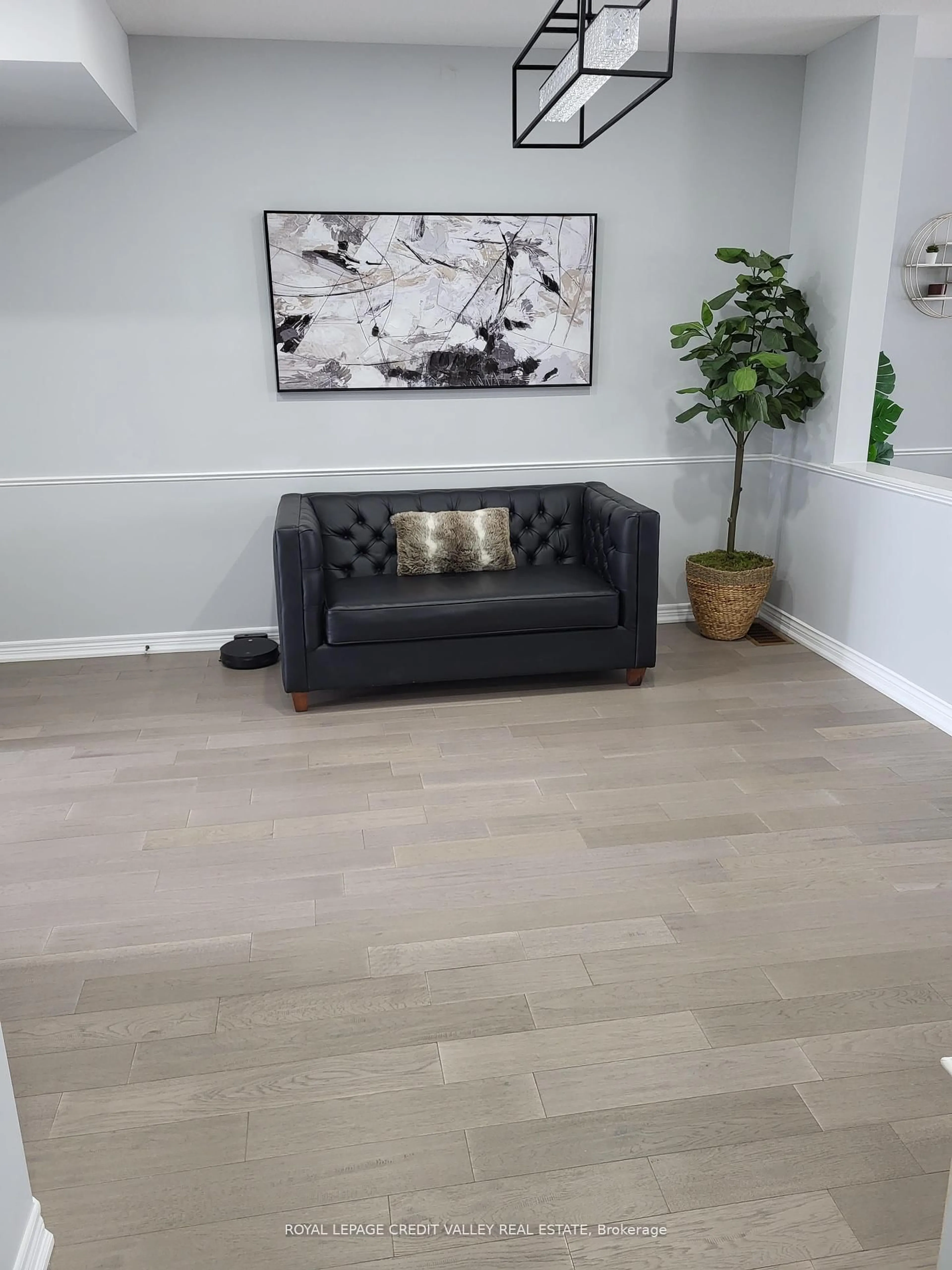 Living room with furniture, wood/laminate floor for 50 Fairgrounds Dr, Hamilton Ontario L0R 1C0