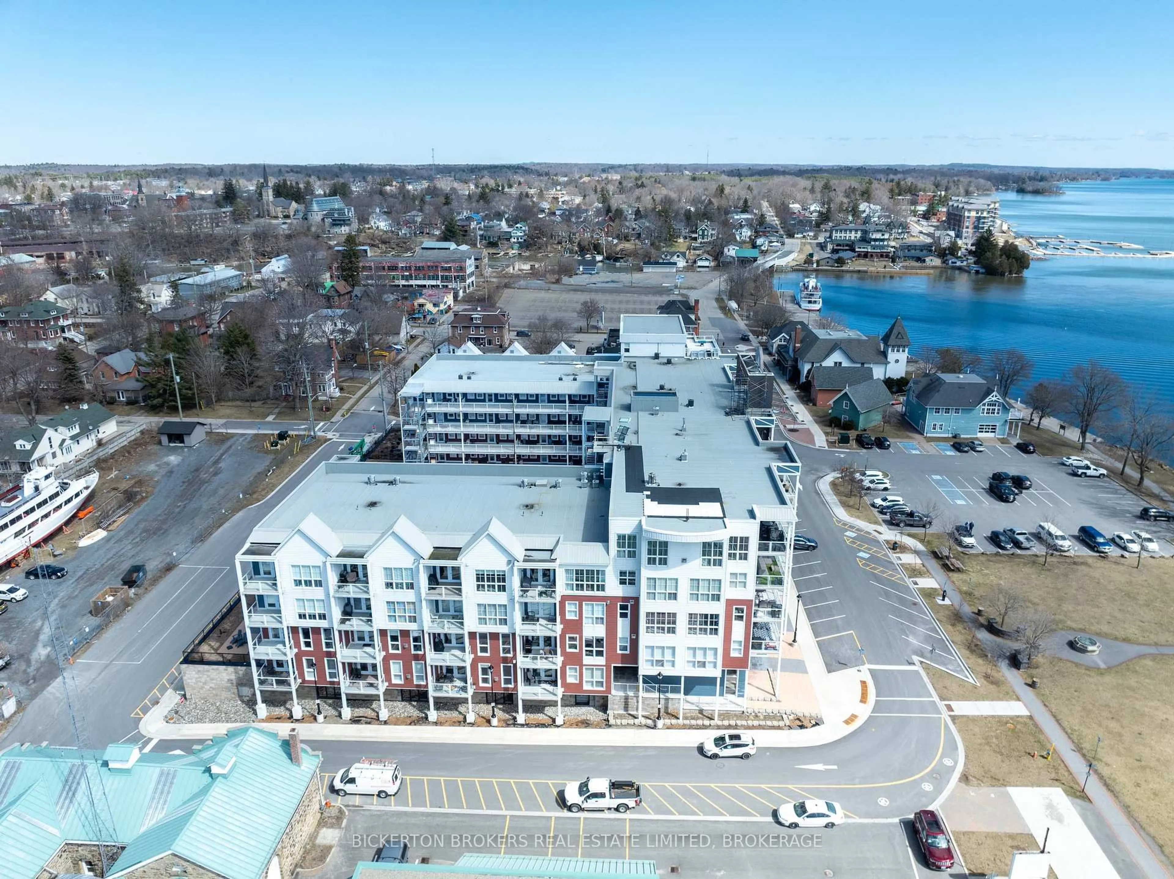 A pic from outside/outdoor area/front of a property/back of a property/a pic from drone, water/lake/river/ocean view for 130 Water St #212, Gananoque Ontario K7G 0A8