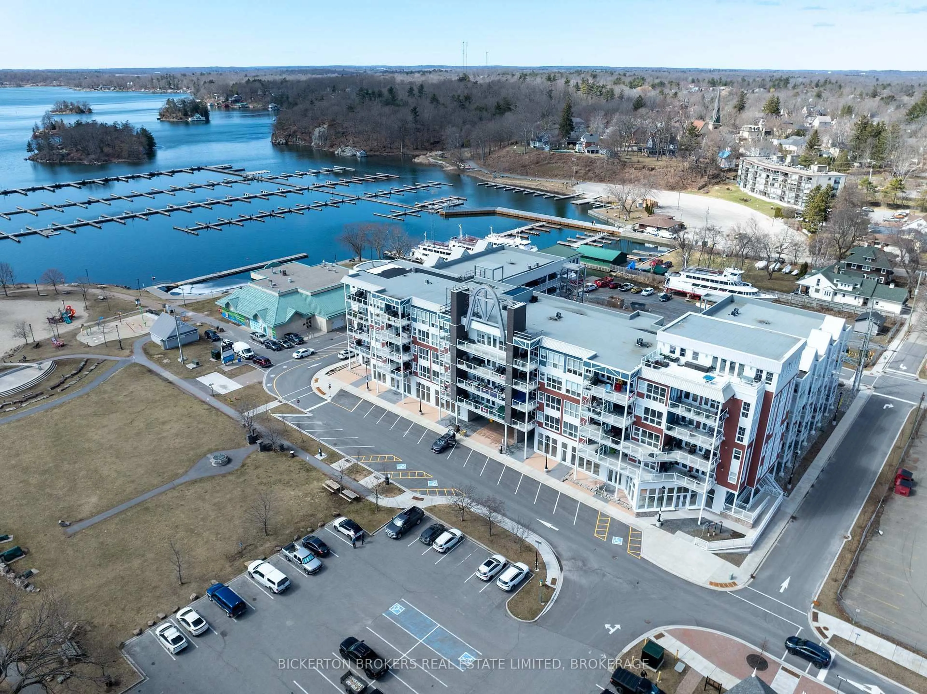 A pic from outside/outdoor area/front of a property/back of a property/a pic from drone, water/lake/river/ocean view for 130 Water St #212, Gananoque Ontario K7G 0A8