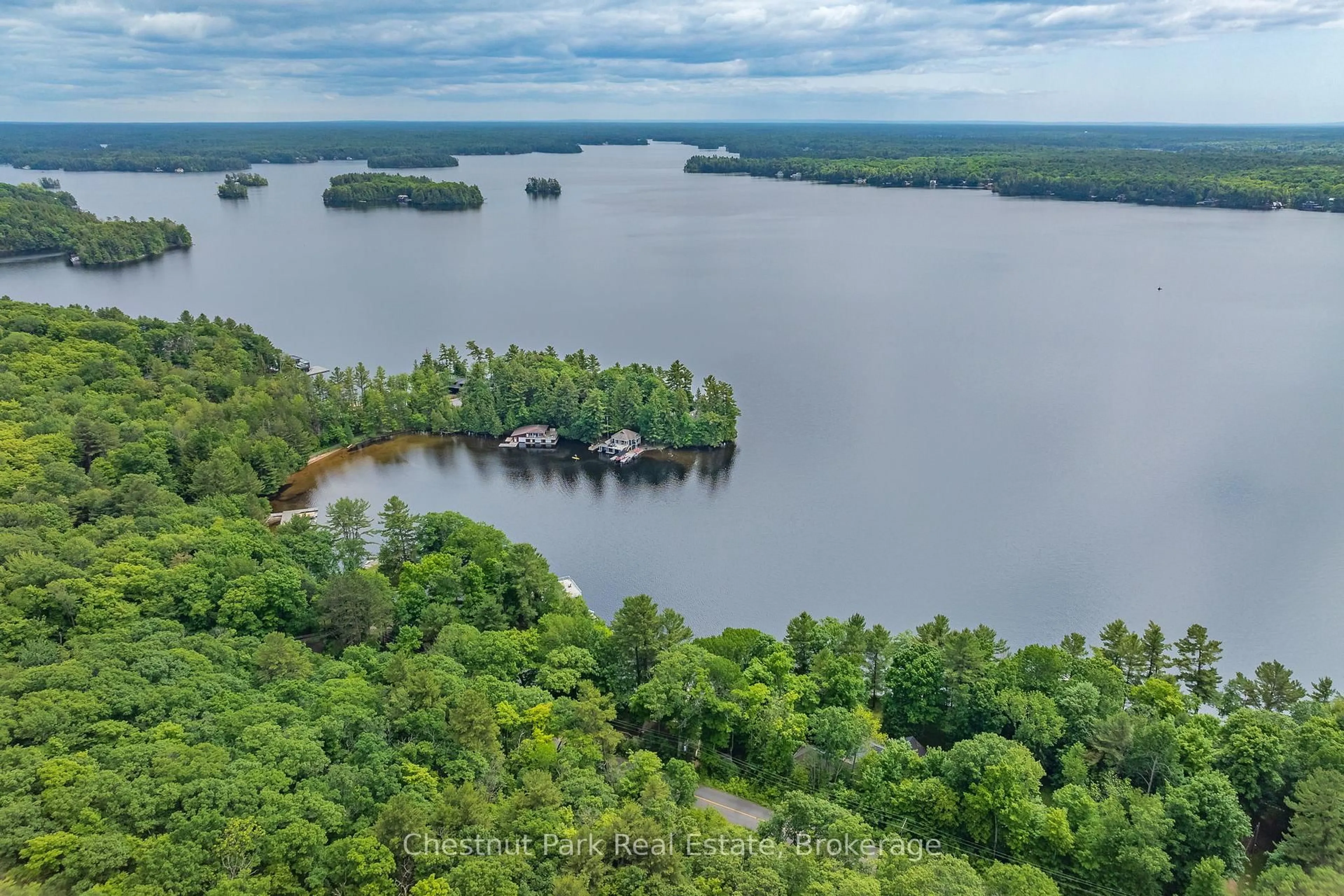 A pic from outside/outdoor area/front of a property/back of a property/a pic from drone, water/lake/river/ocean view for 1516 Mortimers Pt Rd, Muskoka Lakes Ontario P0B 1J0