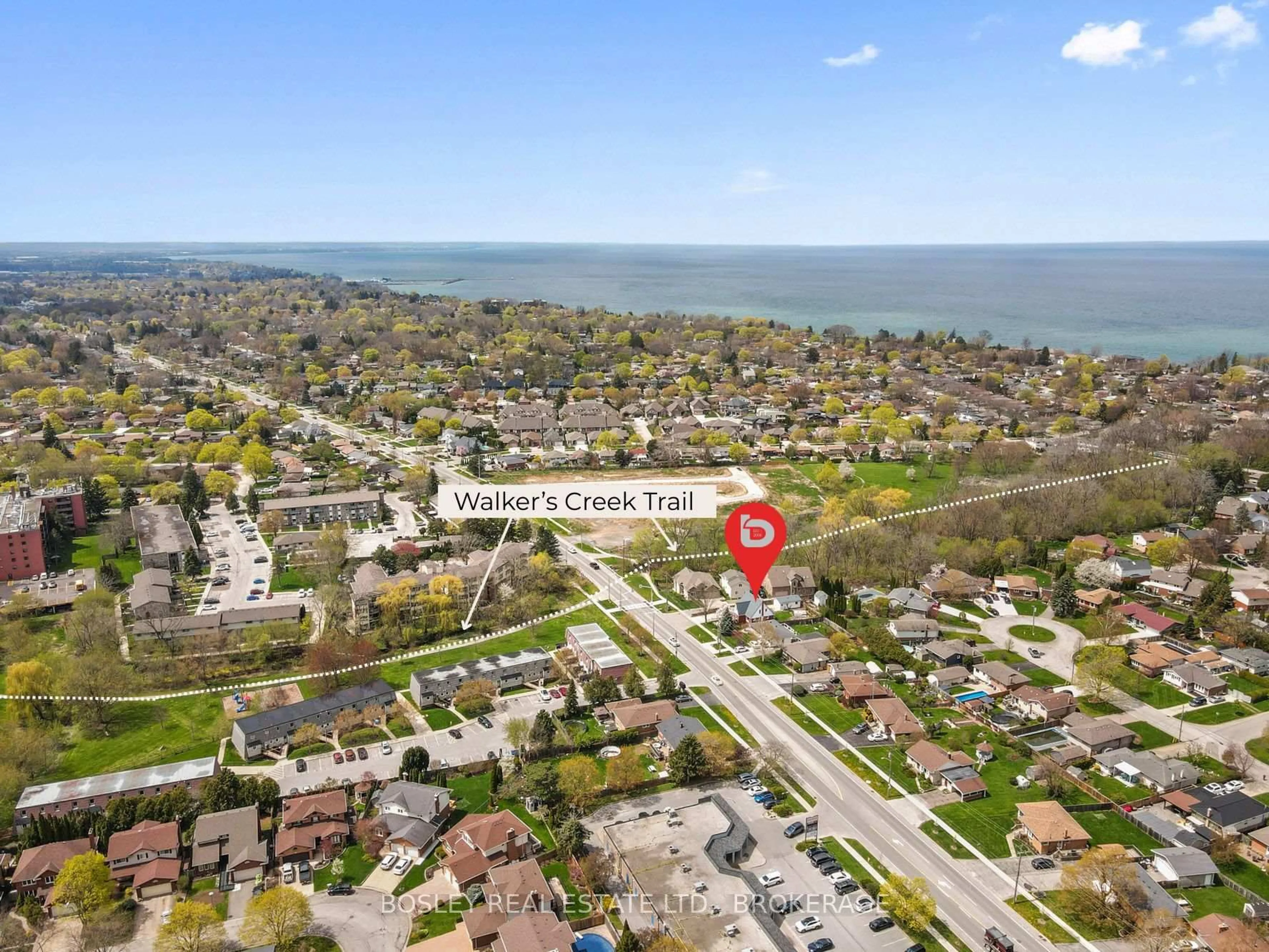 A pic from outside/outdoor area/front of a property/back of a property/a pic from drone, water/lake/river/ocean view for 257 Lakeshore Rd, St. Catharines Ontario L2M 1R9
