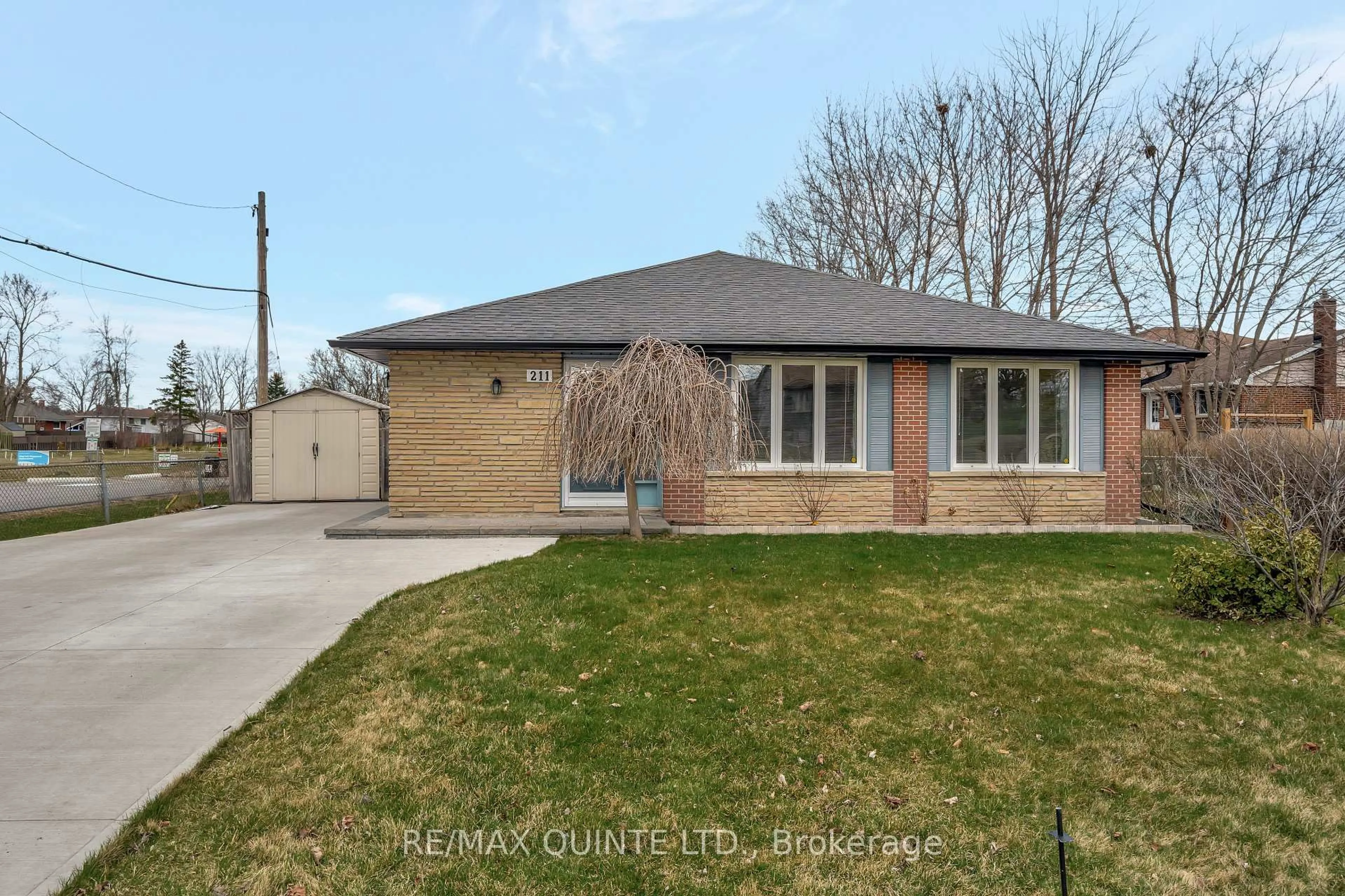 Home with brick exterior material, street for 211 Haig Rd, Belleville Ontario K8N 4P5
