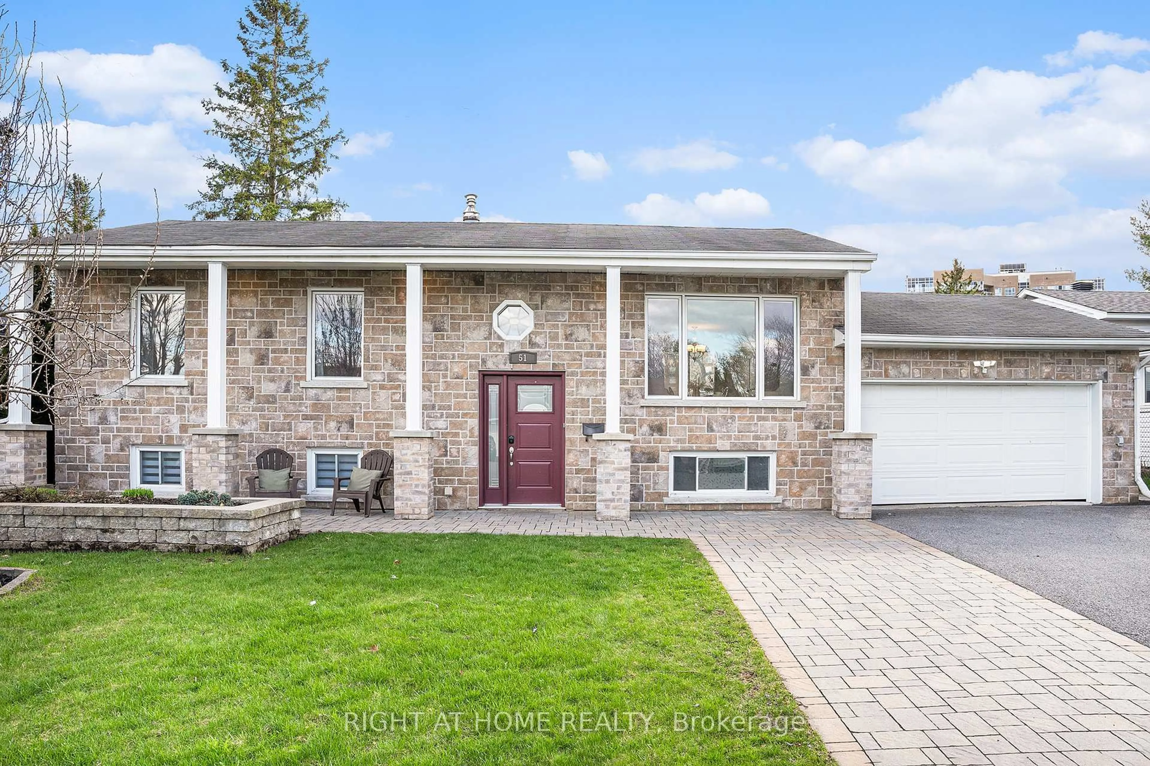 Home with brick exterior material, street for 51 Keewatin Cres, Ottawa Ontario K2E 5S2
