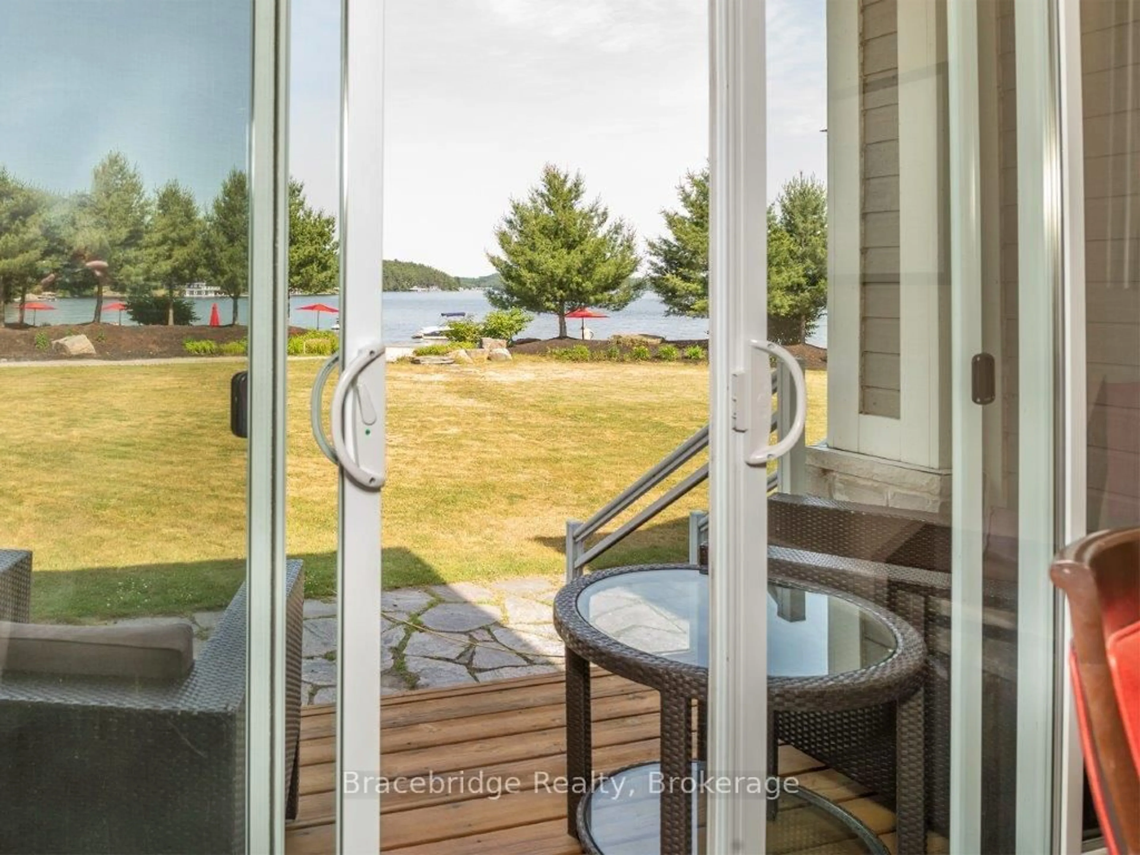 Patio, water/lake/river/ocean view for 1869 MUSKOKA ROAD 118 Highway #G104-D2, Muskoka Lakes Ontario P1L 1W8
