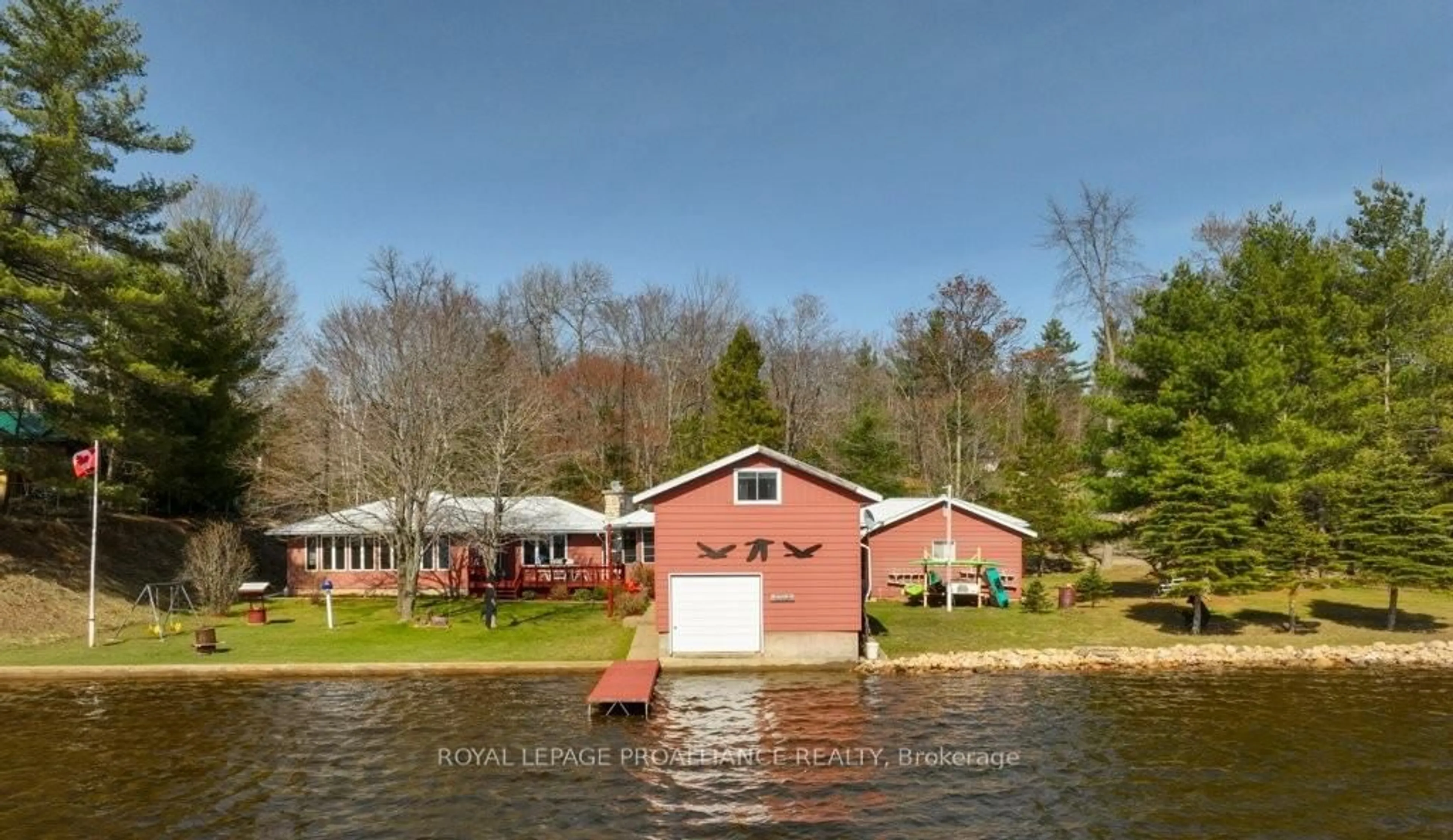 A pic from outside/outdoor area/front of a property/back of a property/a pic from drone, water/lake/river/ocean view for 1063 Perry Rd, Cloyne Ontario K0H 1K0