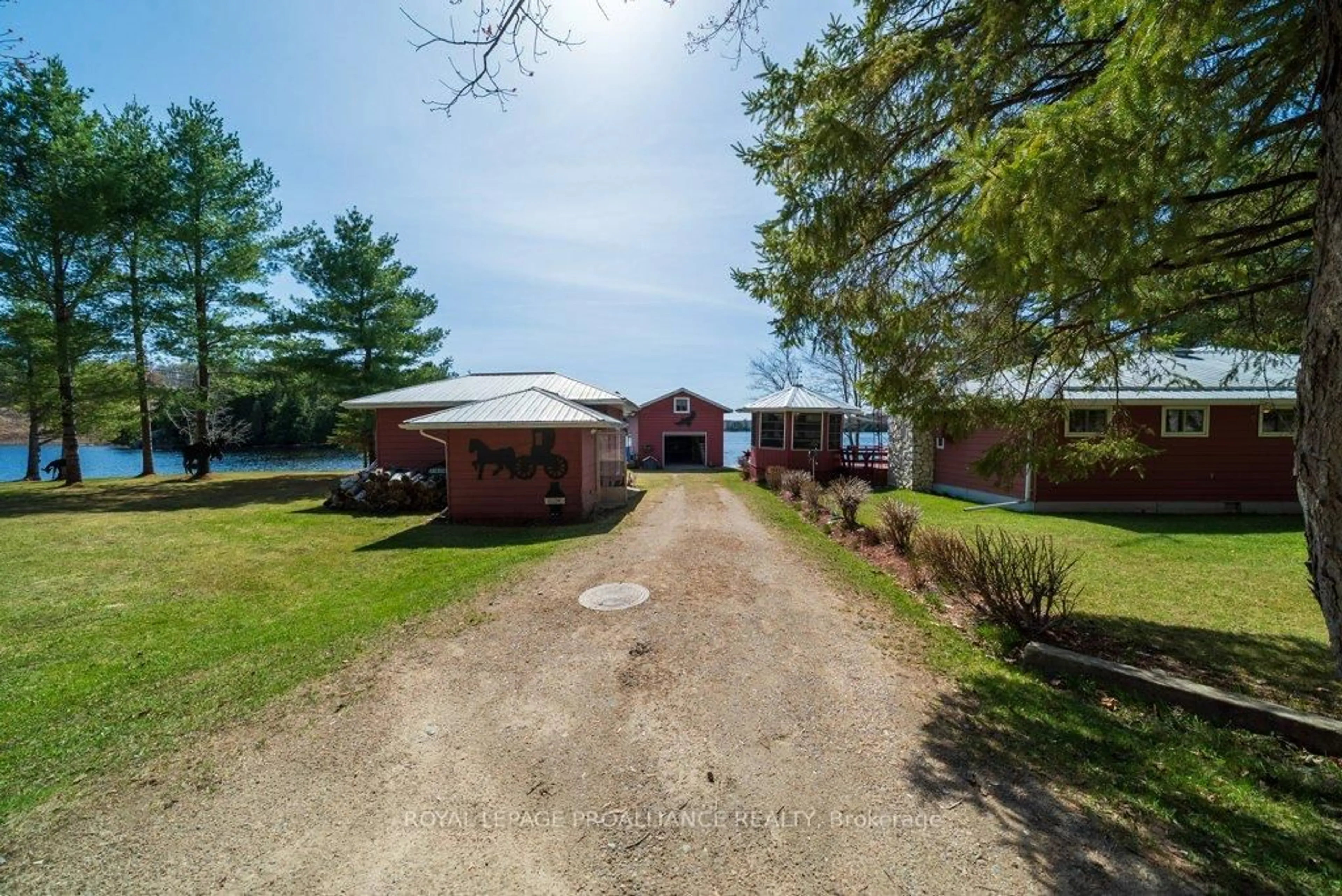 A pic from outside/outdoor area/front of a property/back of a property/a pic from drone, water/lake/river/ocean view for 1063 Perry Rd, Cloyne Ontario K0H 1K0